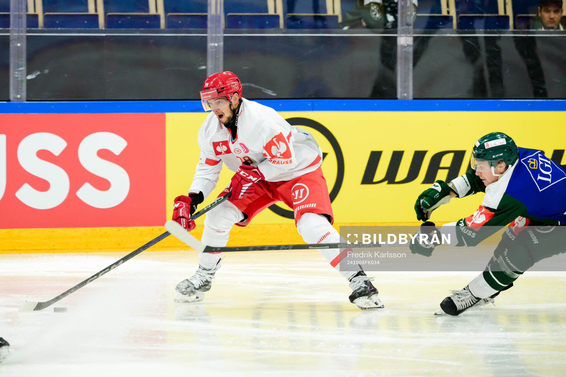 Libor Hudacek of Ocelari Trinec and Oscar Steen of