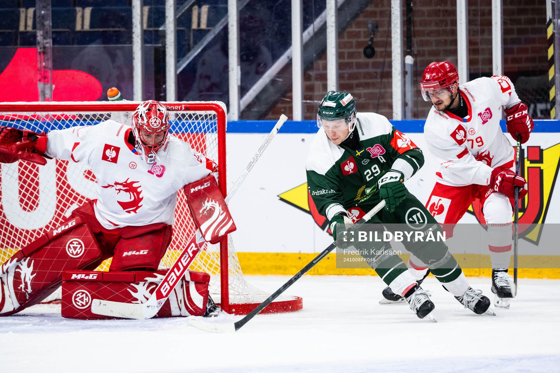 Goaltender Marek Mazanec of Ocelari Trinec and Oscar Steen