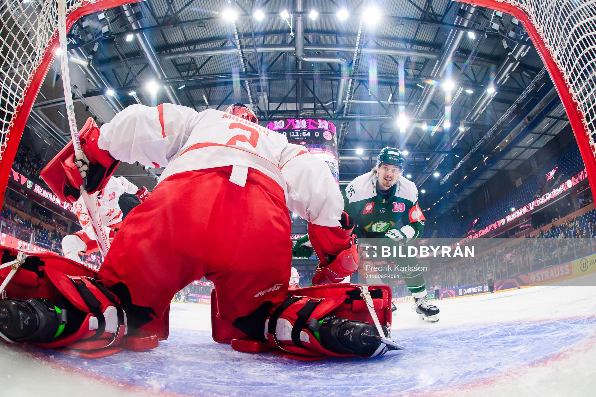 David Tomasek of Färjestad  shoots 1-0 behind goaltender