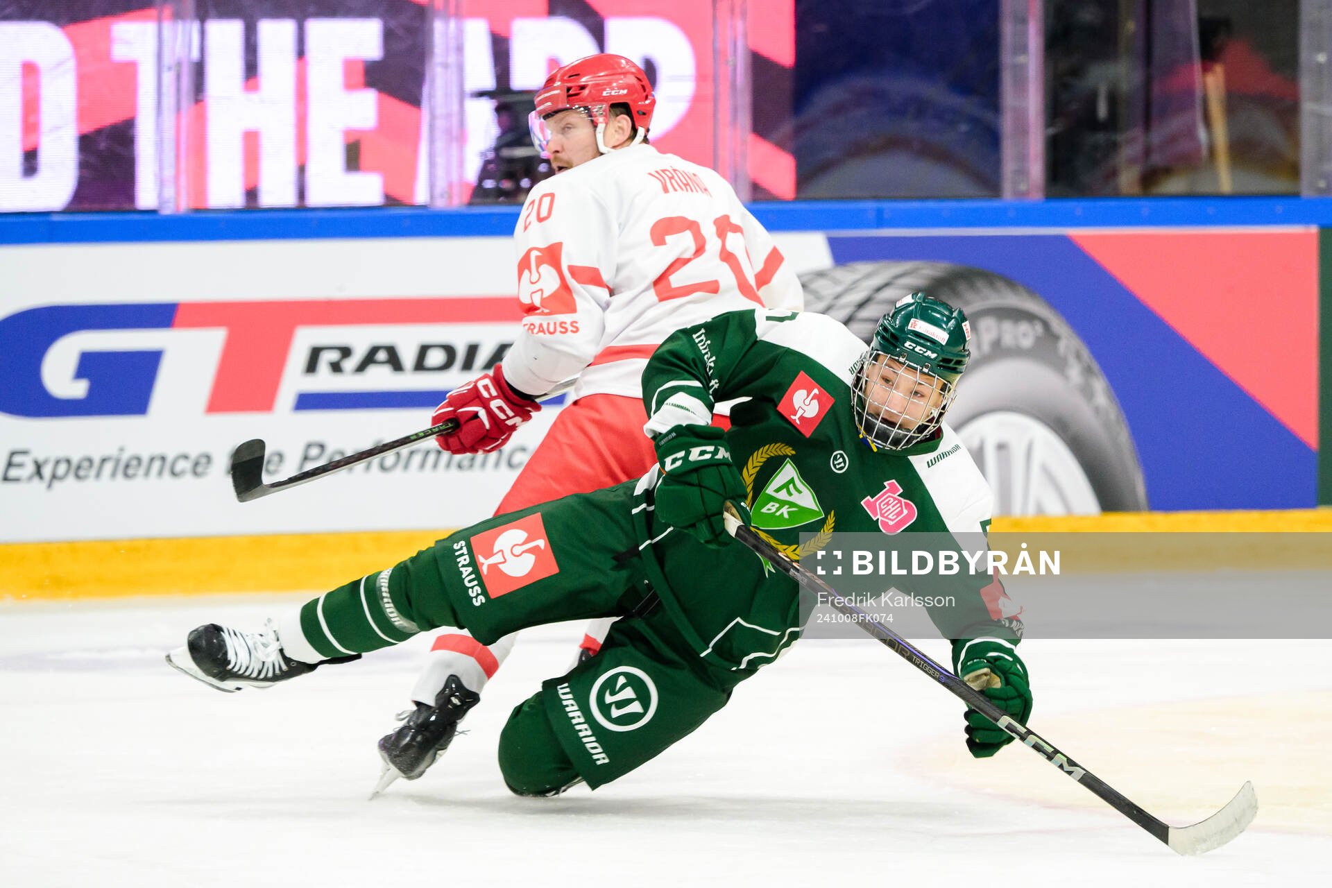 Petr Vrana of Ocelari Trinec and Malte Vass of Färjestad