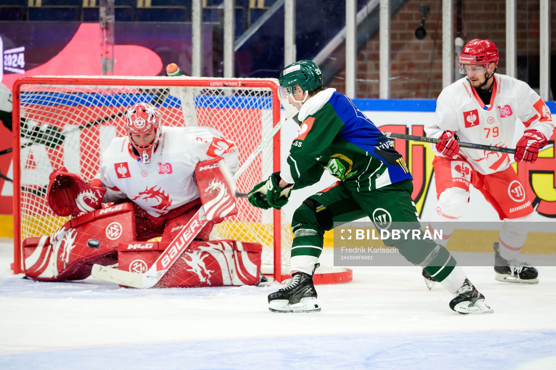 goaltender Marek Mazanec of Ocelari Trinec and Oscar Steen