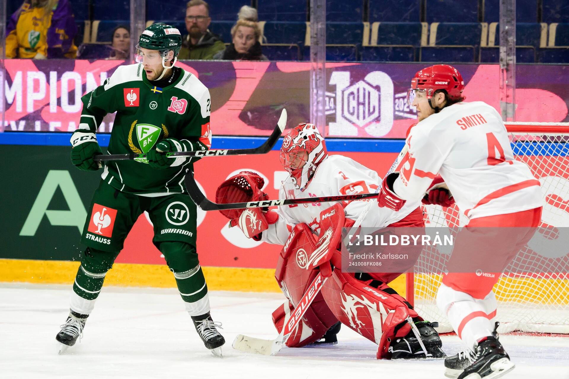 Per Åslund of Färjestad  and goaltender Marek Mazanec and