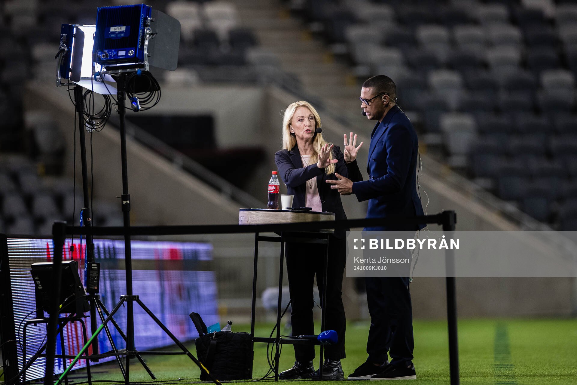 SVTs Jane Björk and SVTs Daniel Nannskog ahead of the UEFA Women's Champions League football match between Hammarby and St Pölten on October 9, 2024 in Stockholm.