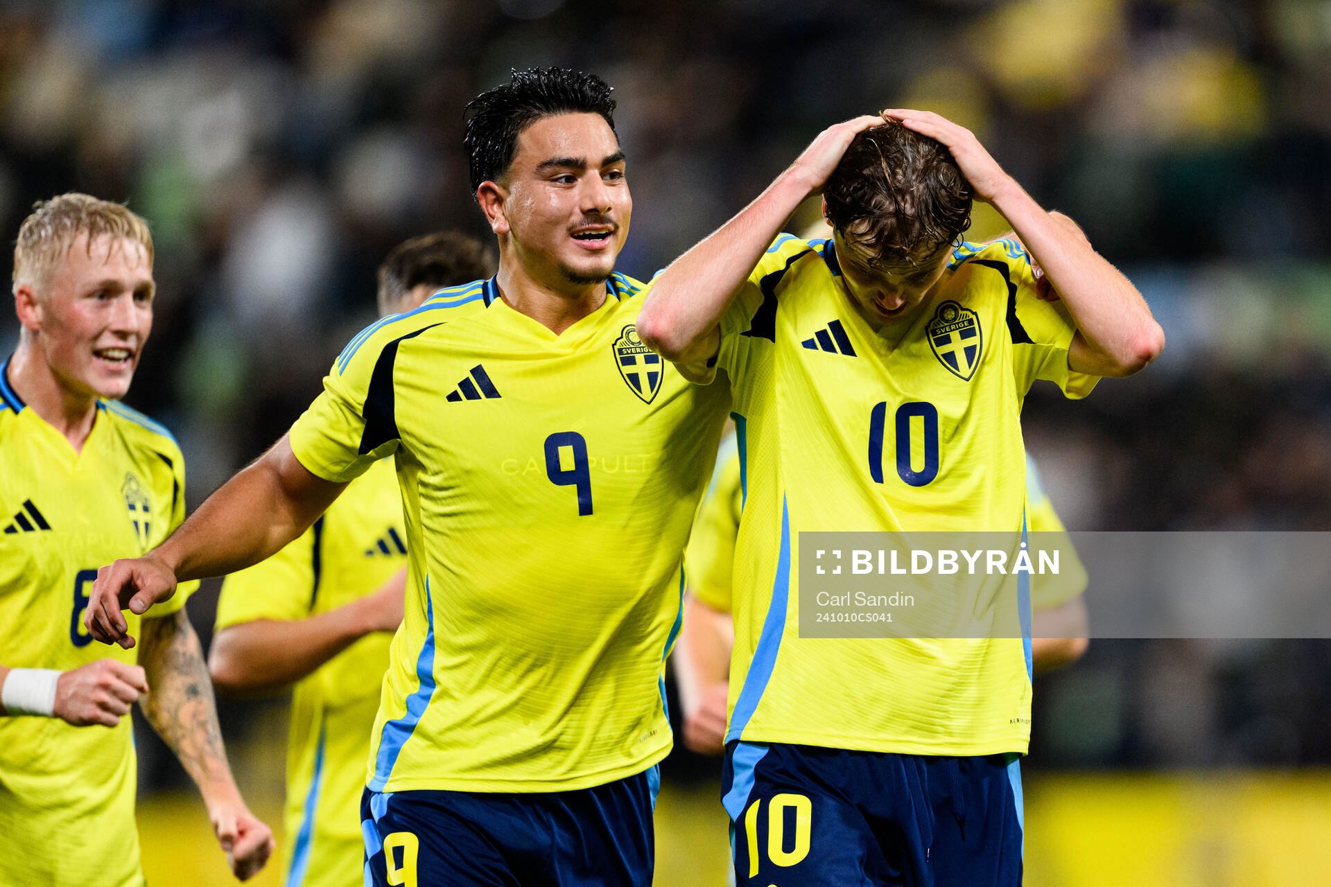 Williot Swedberg of Sweden celebrates with Jusef Erabi