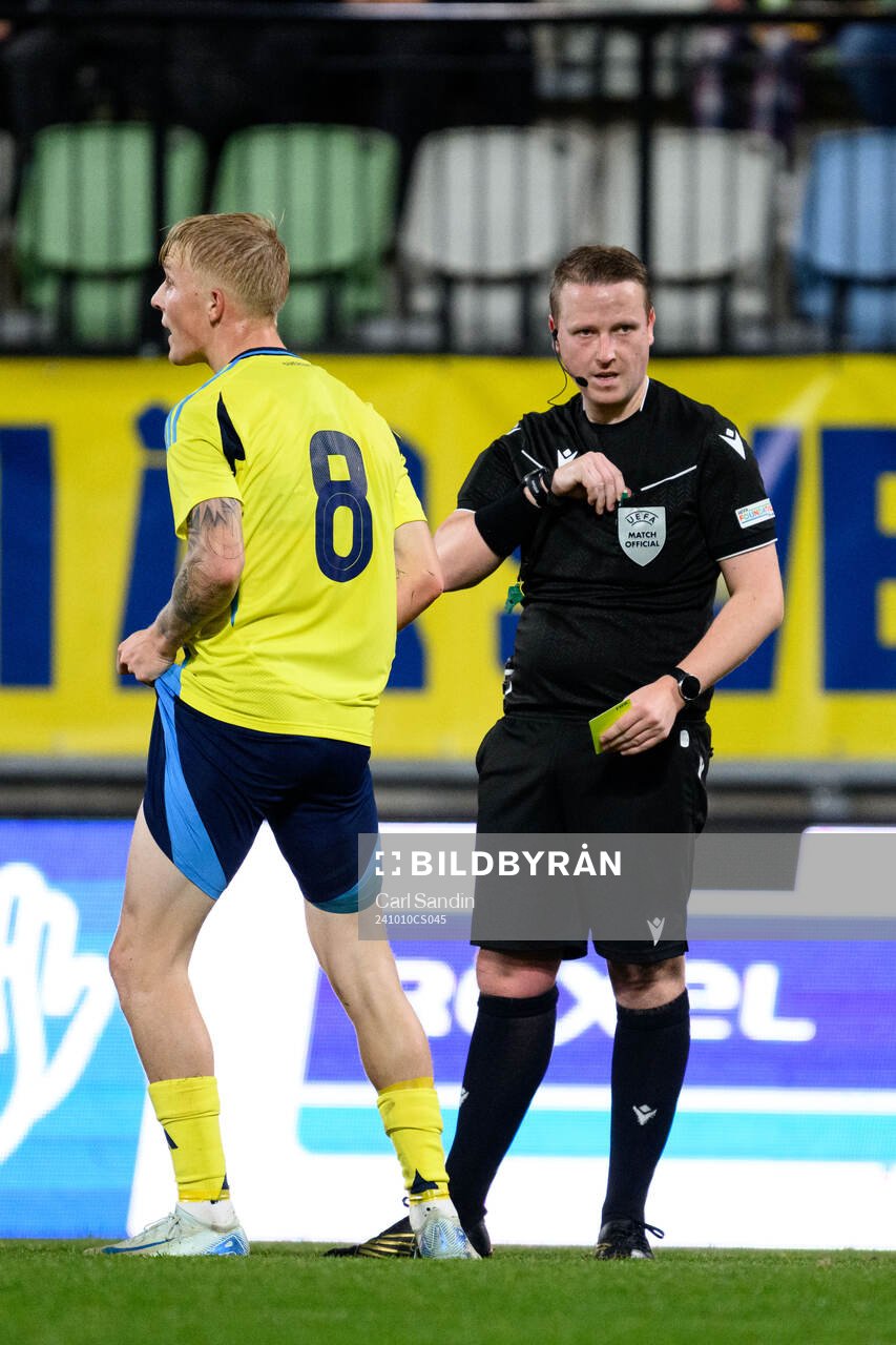Melker Widell of Sweden reacts against Referee  Iwan Arwel