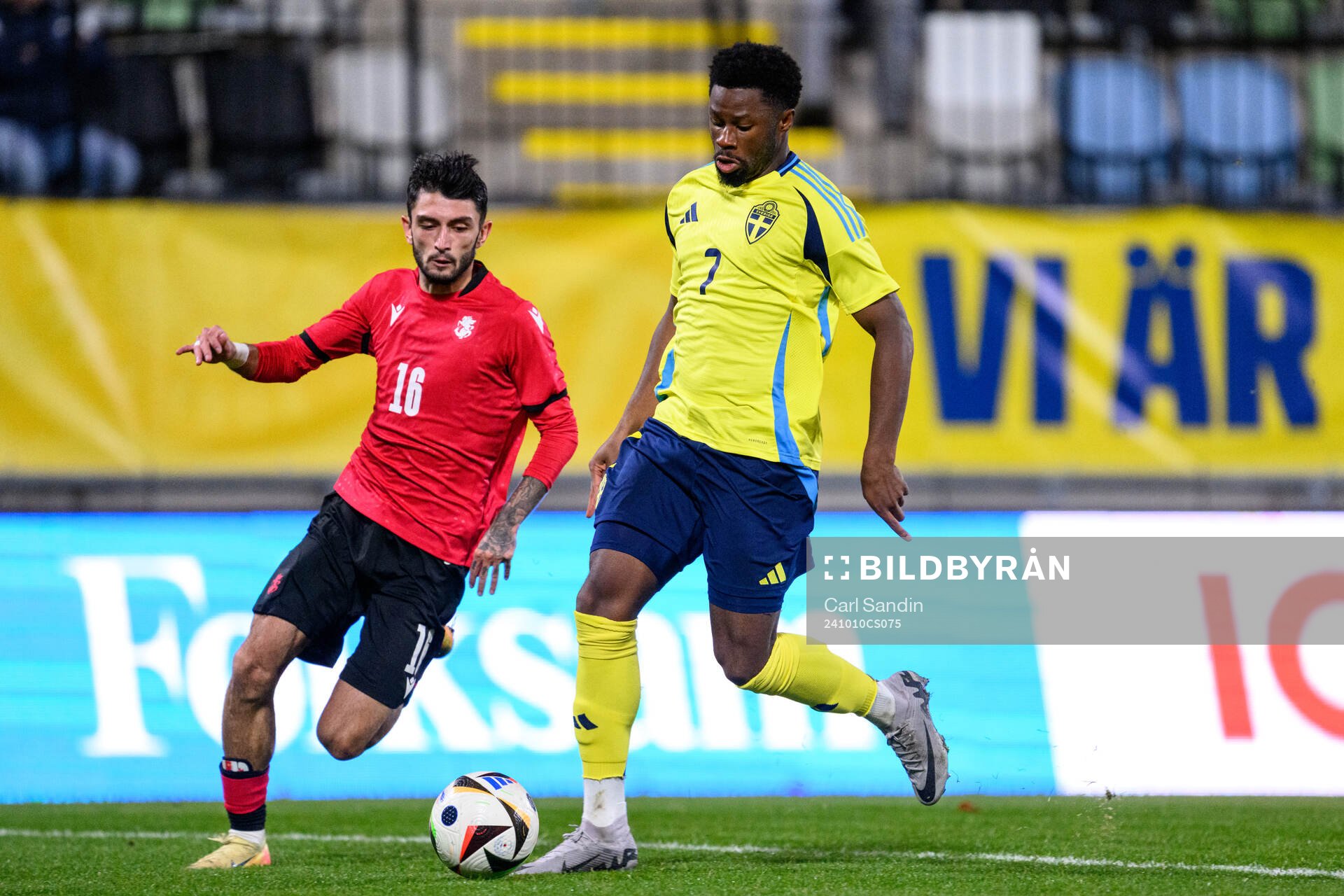 Irakli Azarov of Georgia and Emmanuel Ekong of Sweden during the UEFA European Under-21 Qualifier football match between Sweden and Georgia on October 10, 2024 in Jönköping.