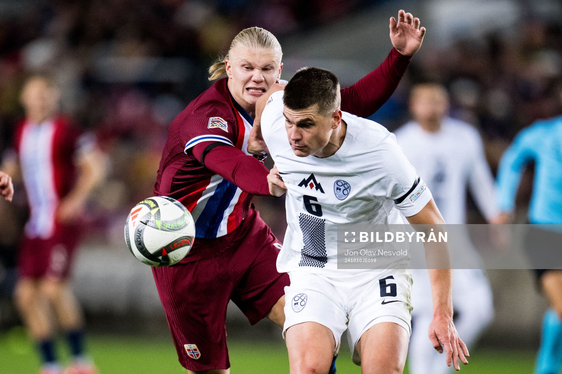 Erling Braut Haaland of Norway and Jaka Bijol of Slovenia