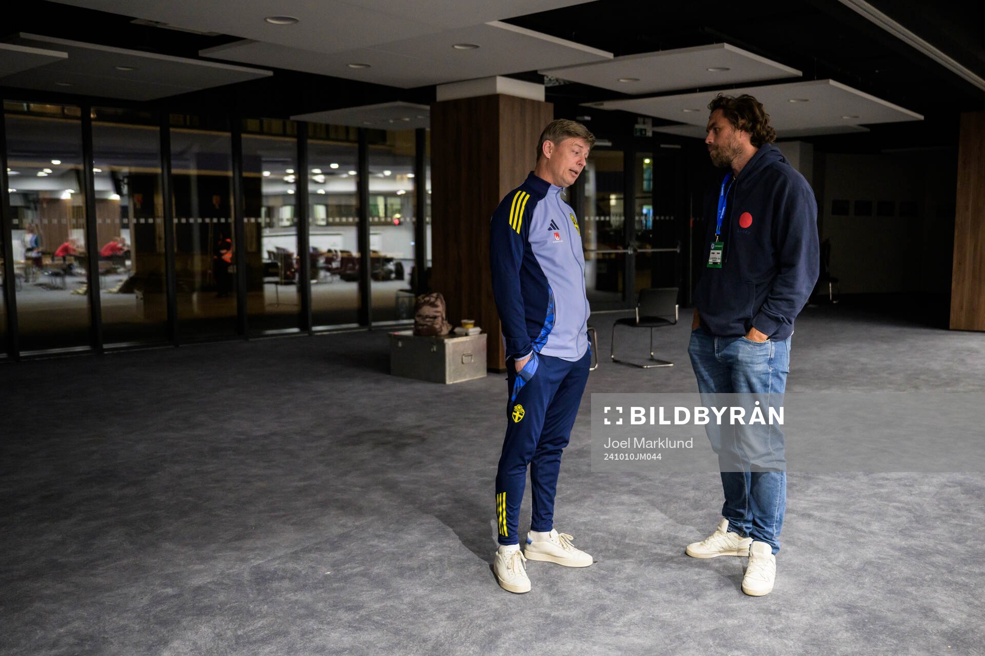 Head coach Jon Dahl Tomasson of the Swedish men's national football team and former football player Johan Elmander after a press conference on October 10, 2024 in Bratislava. 
