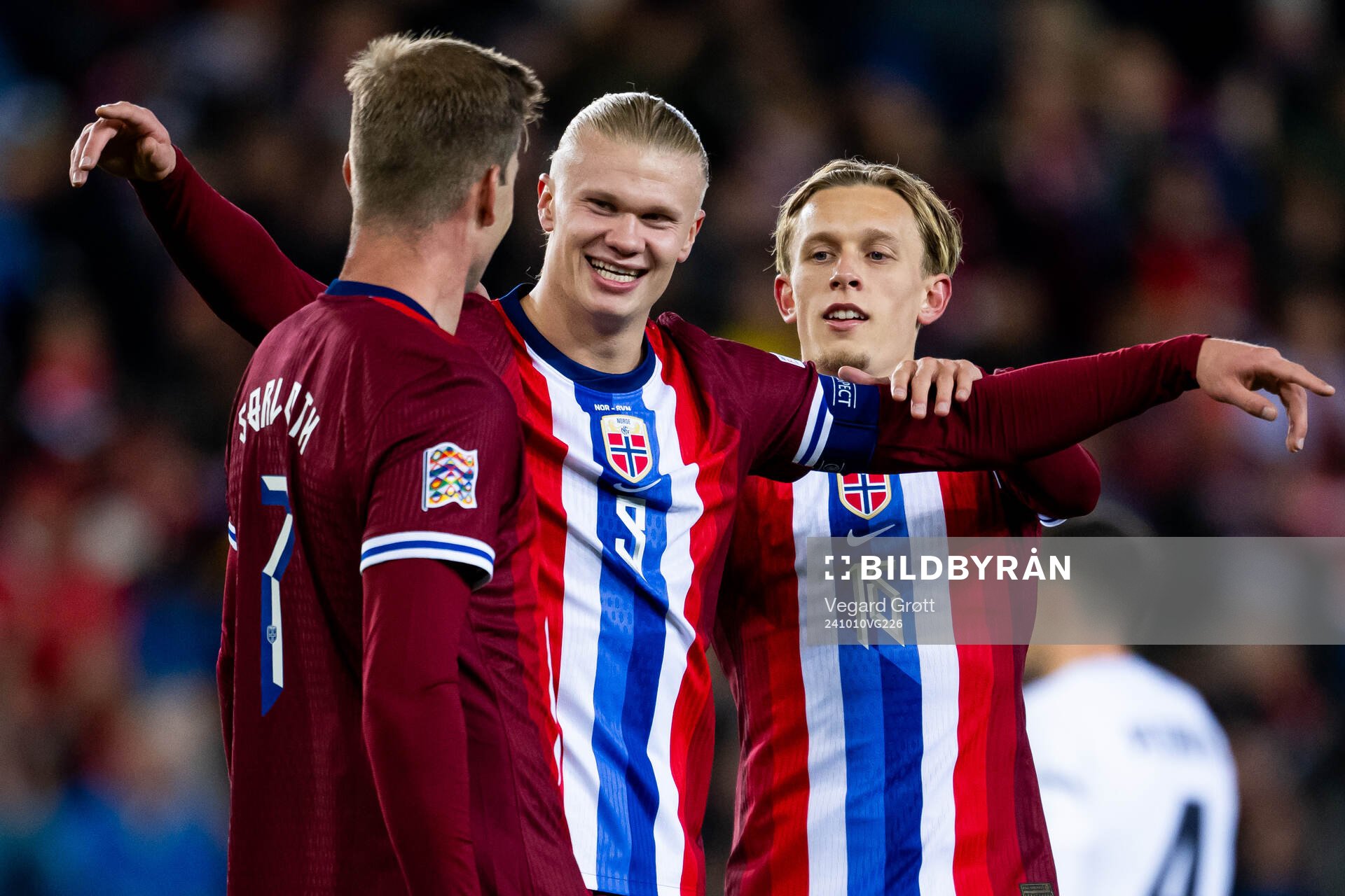 Erling Braut Haaland celebrates with teammates Alexander