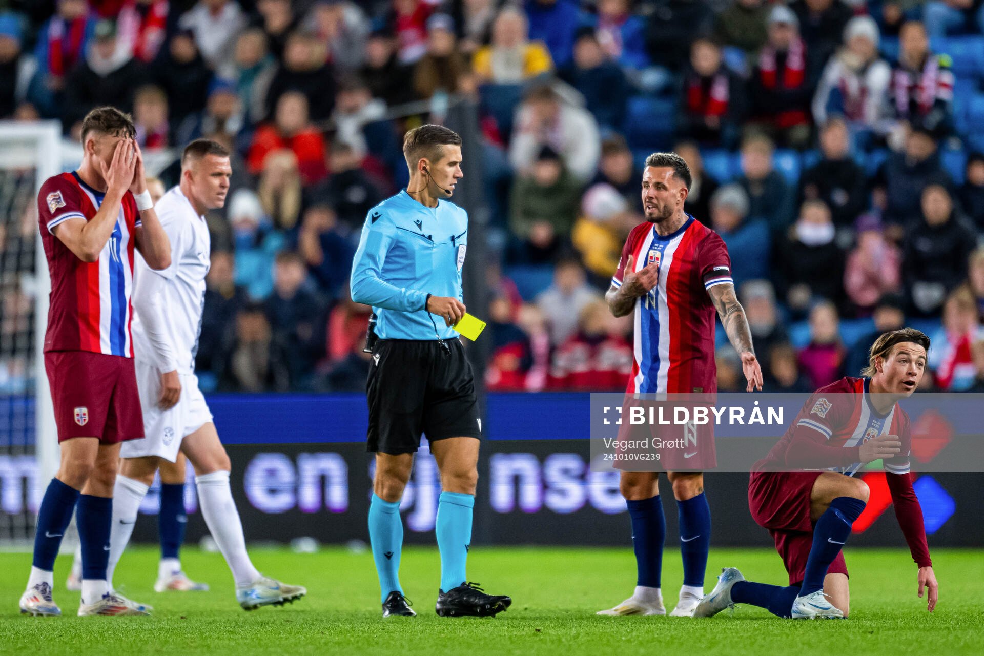 Referee Manfredas Lukjancukas, Aron Dønnum of Norway and