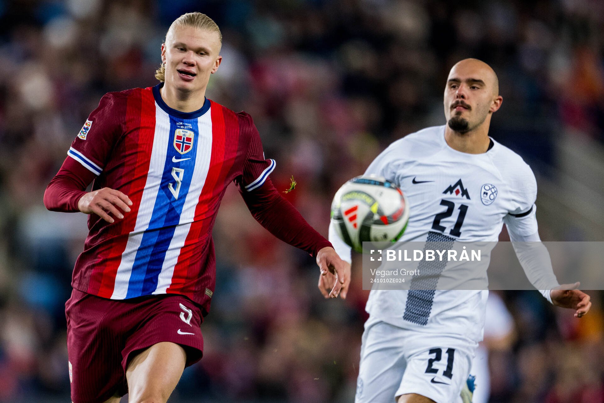 Erling Braut Haaland of Norway and Vanja Drkusic of Slovenia