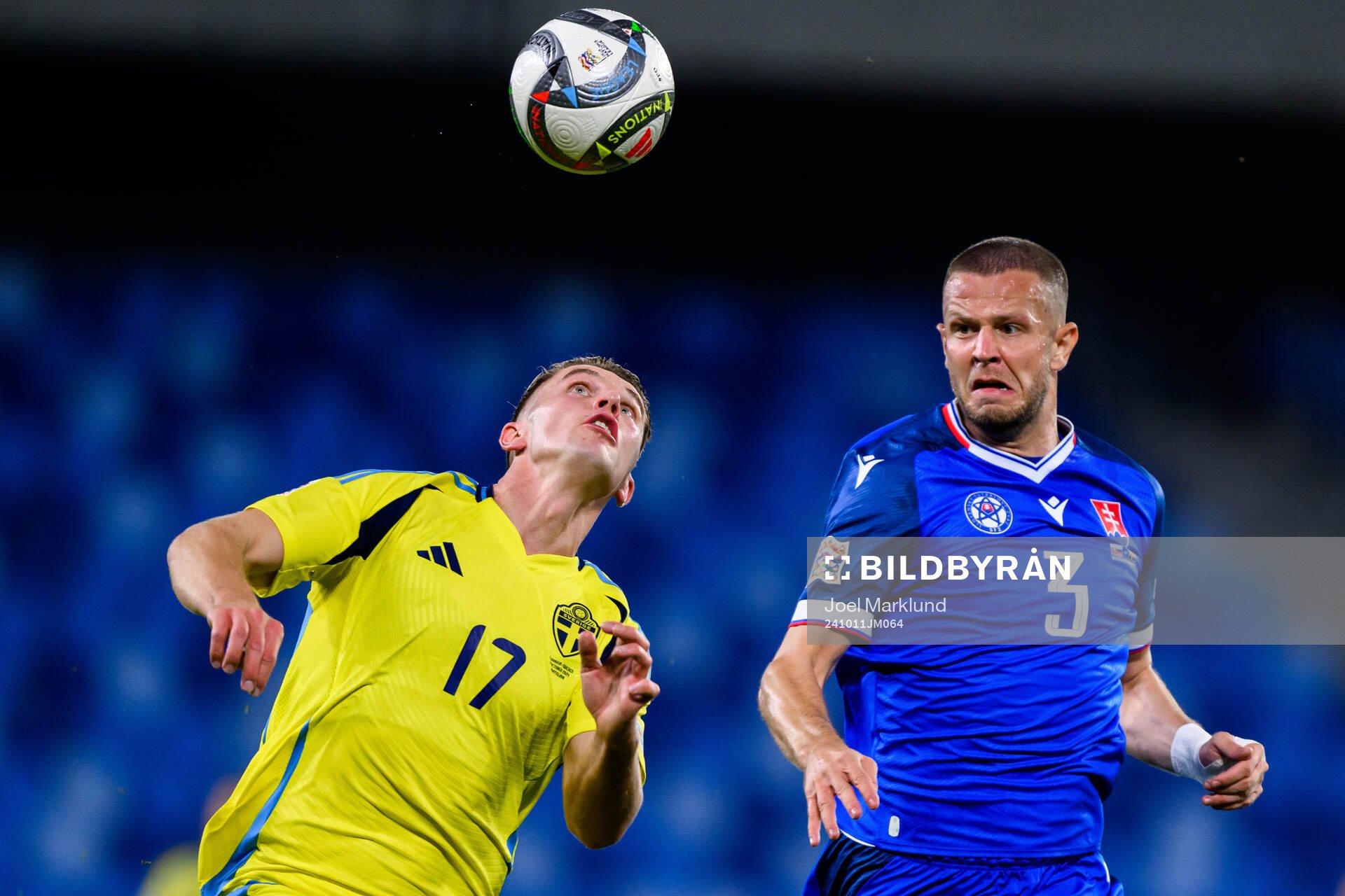Viktor Gyökeres of Sweden and Denis Vavro of Slovakia