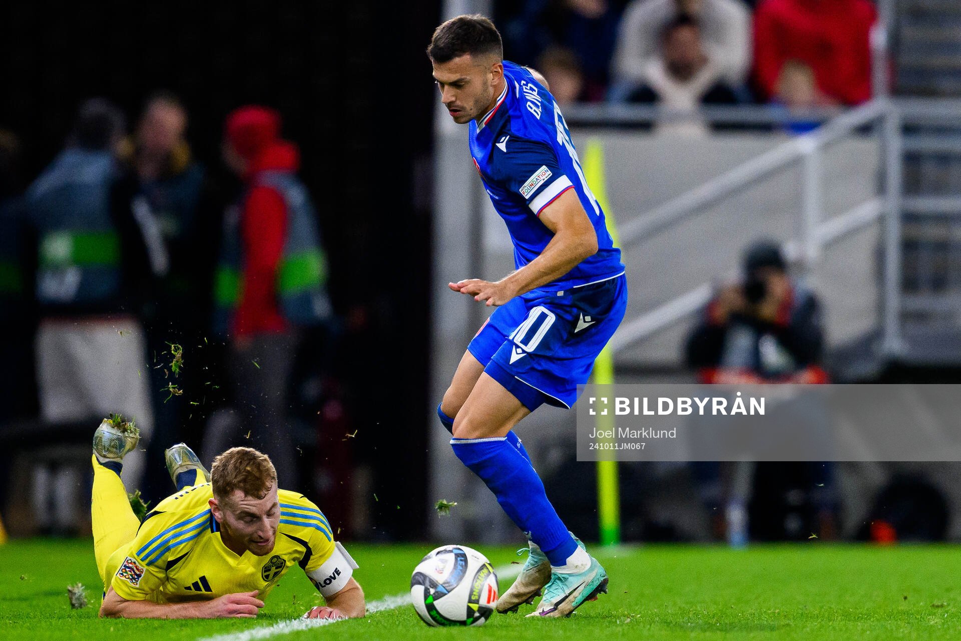 Dejan Kulusevski of Sweden and Lászlo Bénes of Slovakia
