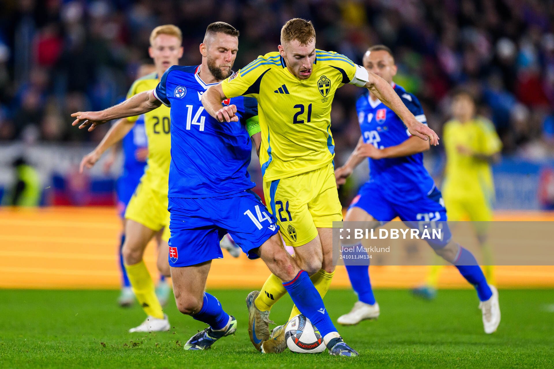 Milan Skriniar of Slovakia and Dejan Kulusevski of Sweden