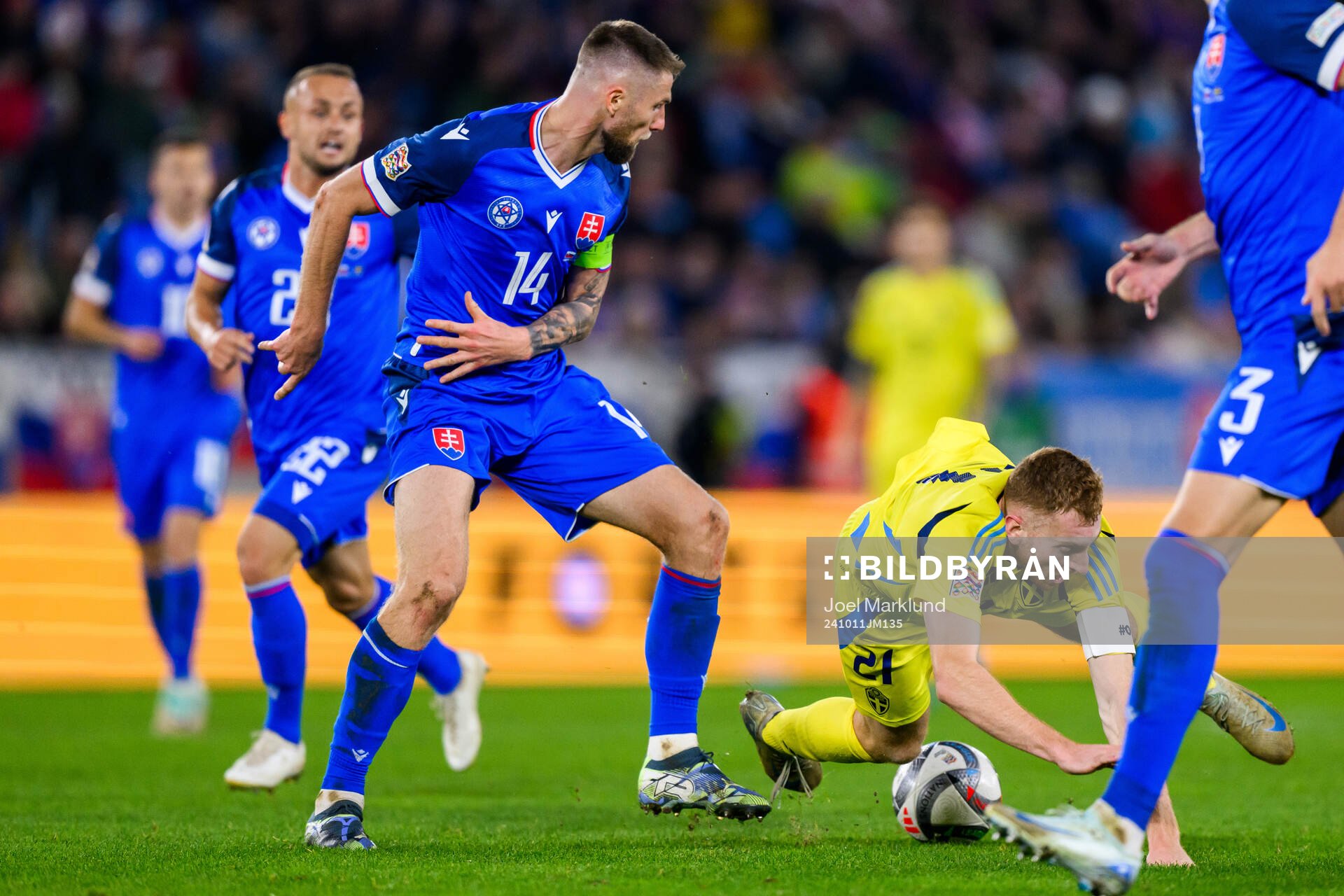 Milan Skriniar of Slovakia and Dejan Kulusevski of Sweden
