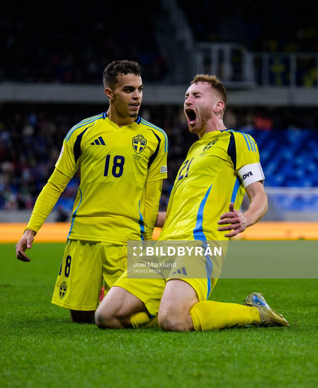 Yasin Ayari and Dejan Kulusevski of Sweden celebrate the