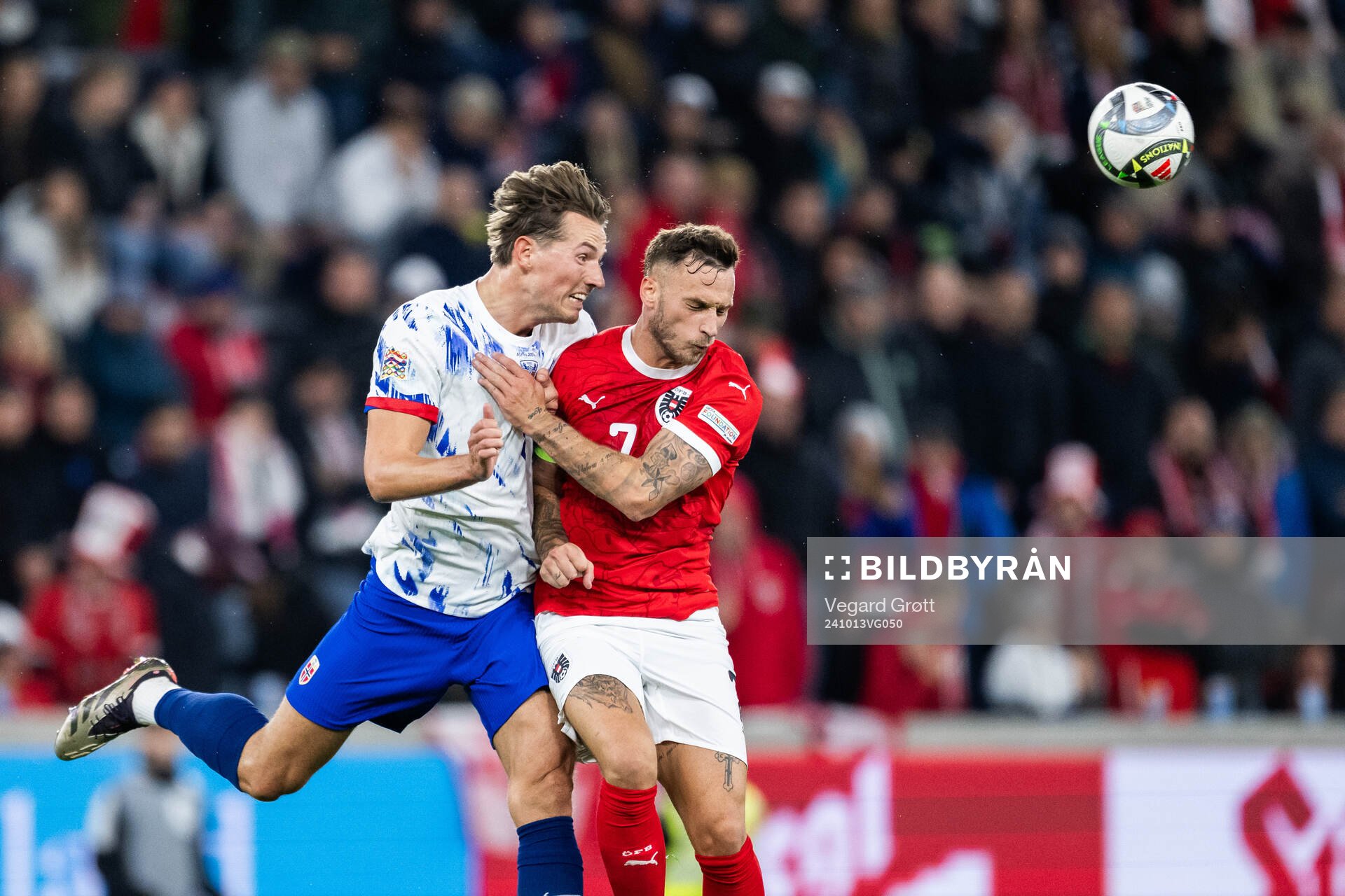 Sander Berge of Norway and Marko Arnautovic of Austria