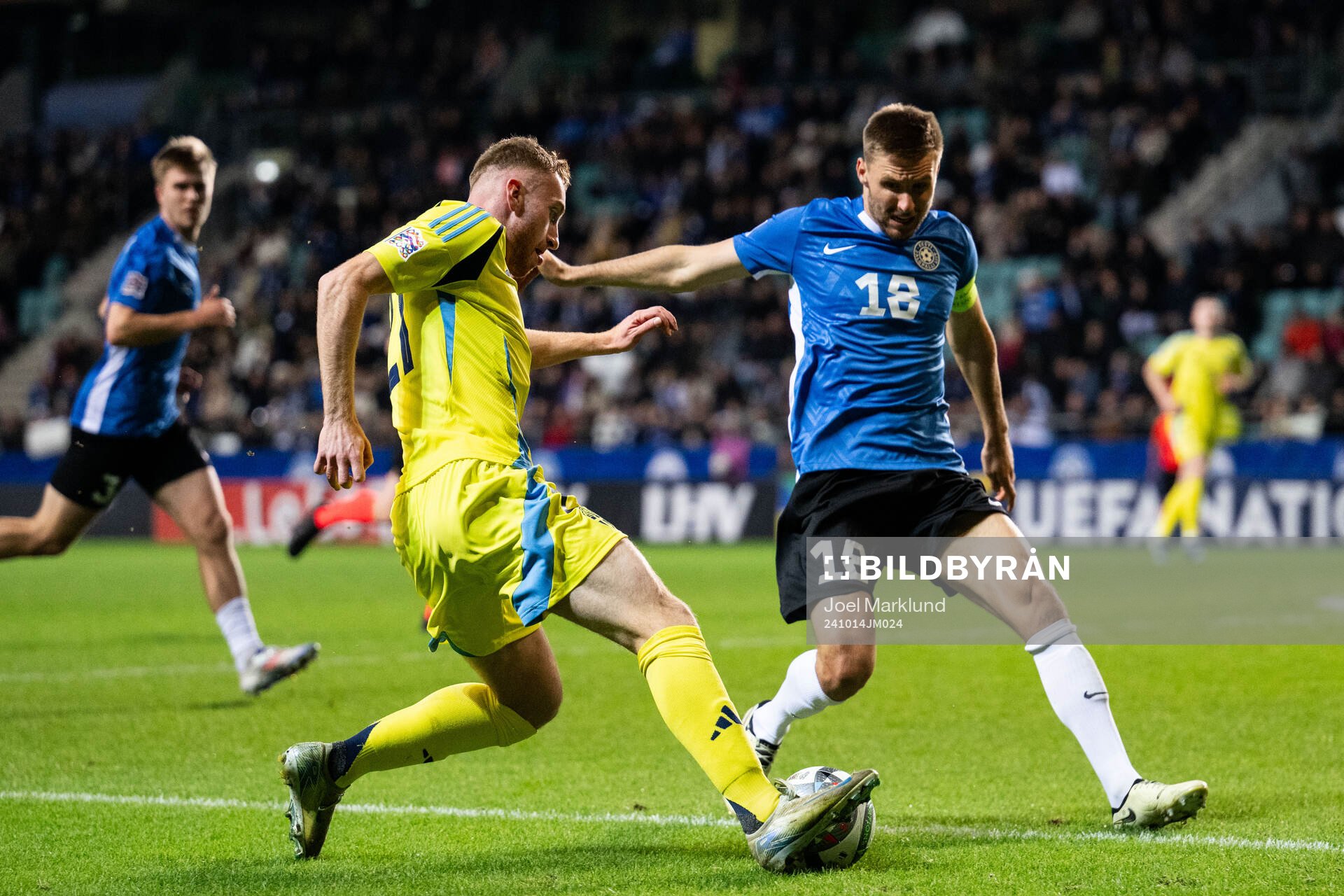 Dejan Kulusevski of Sweden and Karol Mets of Estonia