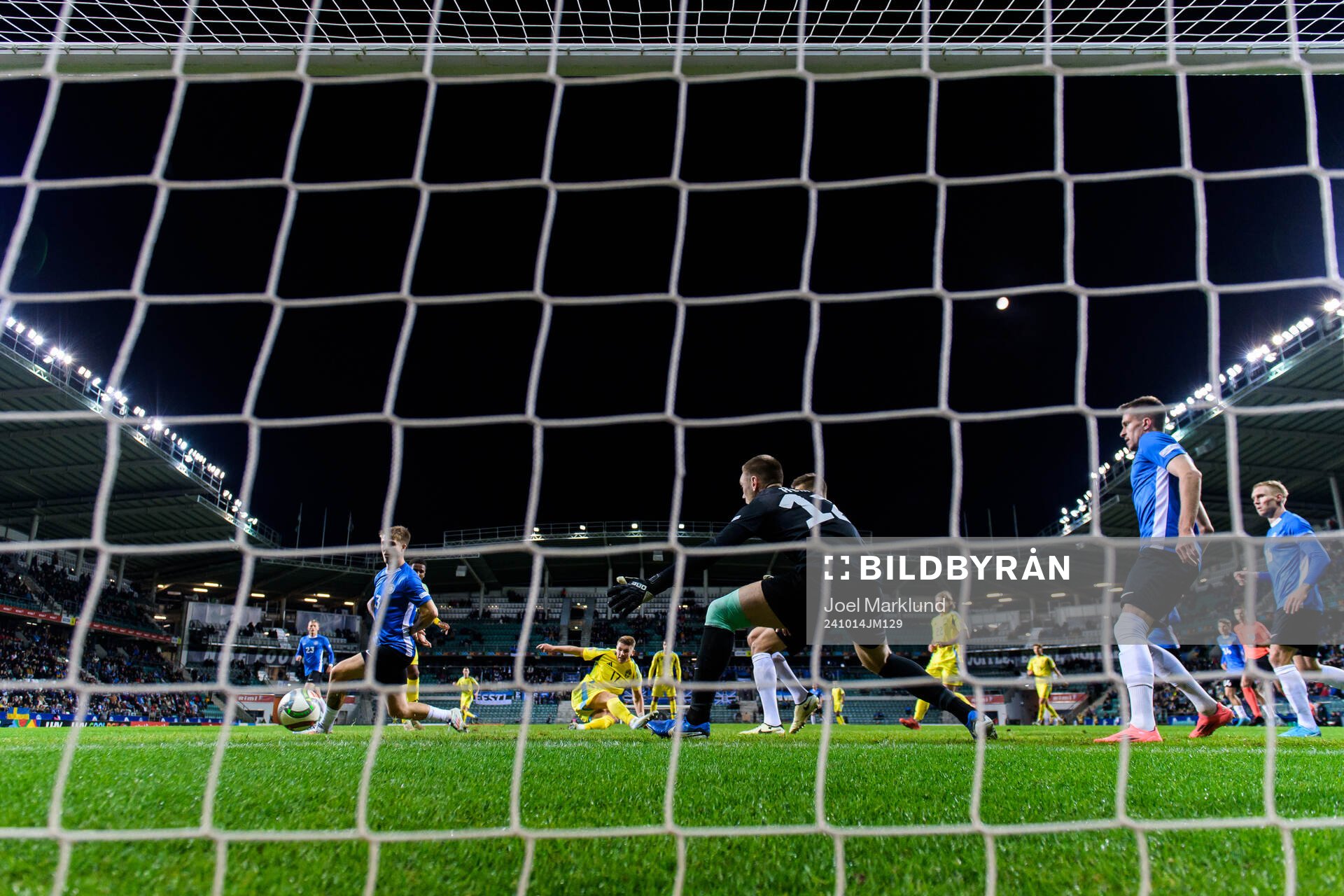 Viktor Gyökeres of Sweden scores 0-3 behind goalkeeper