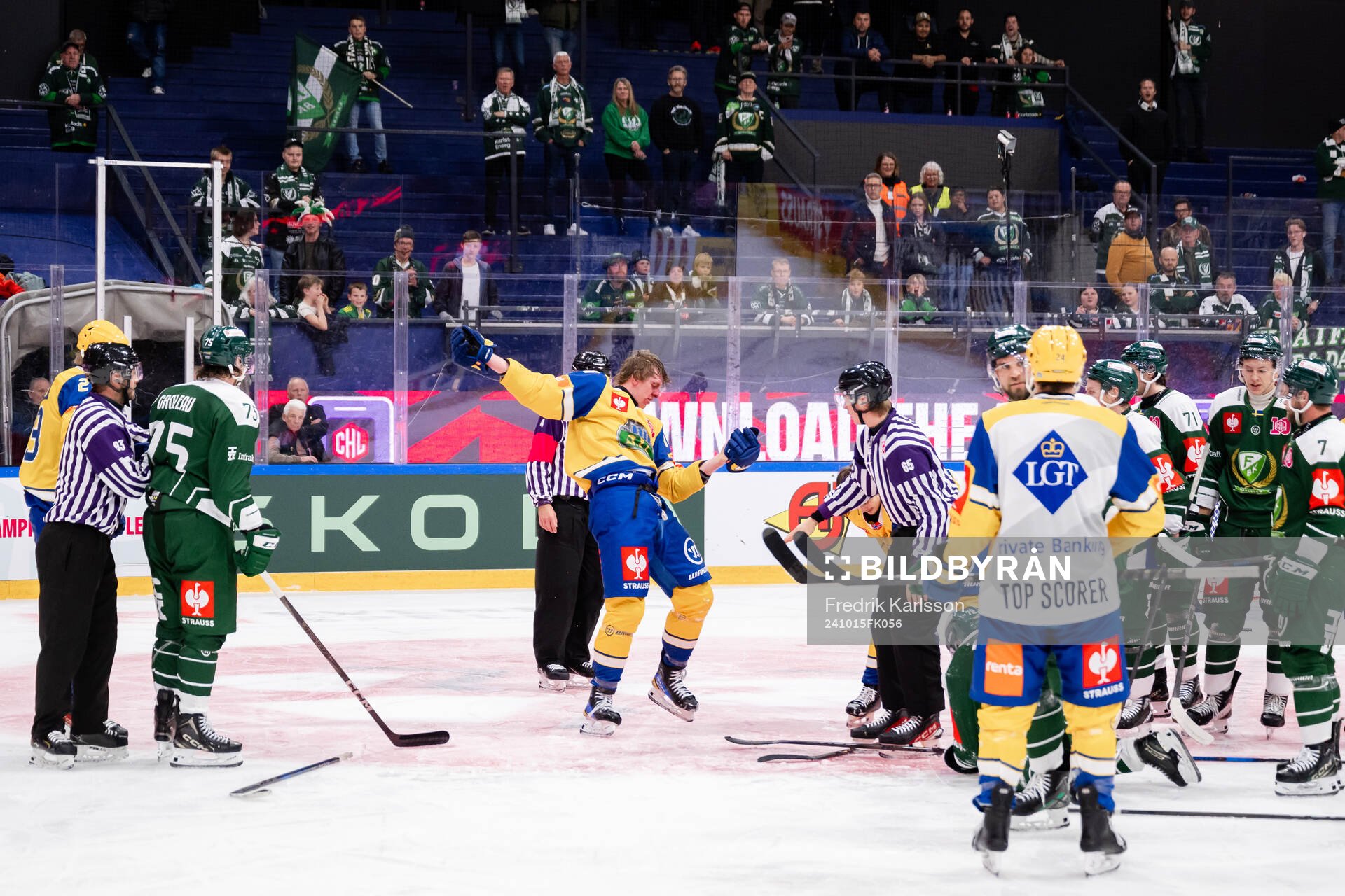 Sverre Rönningen of Storhamar fights Stian Solberg of