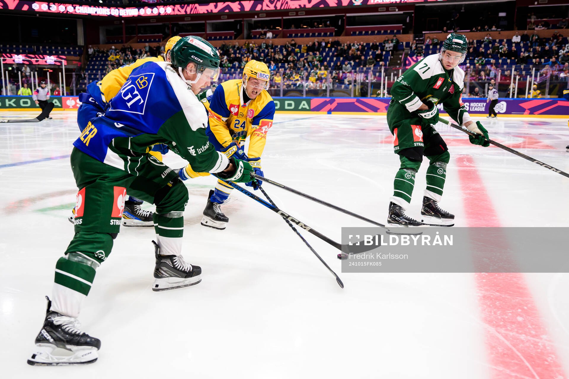Oscar Steen of Färjestad  and Cole Schneider of Storhamar