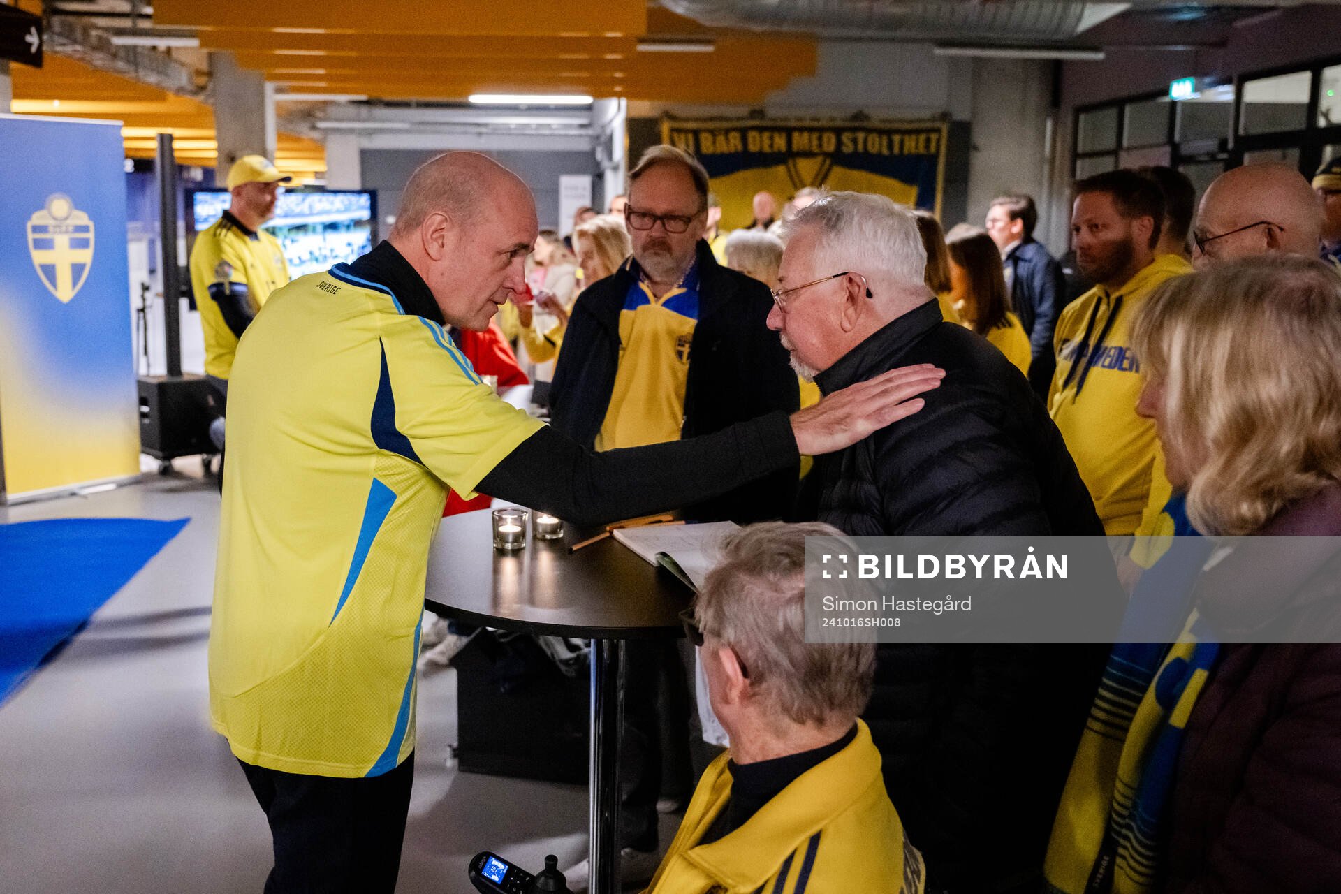President Fredrik Reinfeldt of the Swedish Football Association and survivor Pelle Westerlund during the one year anniversary memorial service for the two victims of the terror attack in Brussels 2023 on October 16, 2024 in Stockholm. 