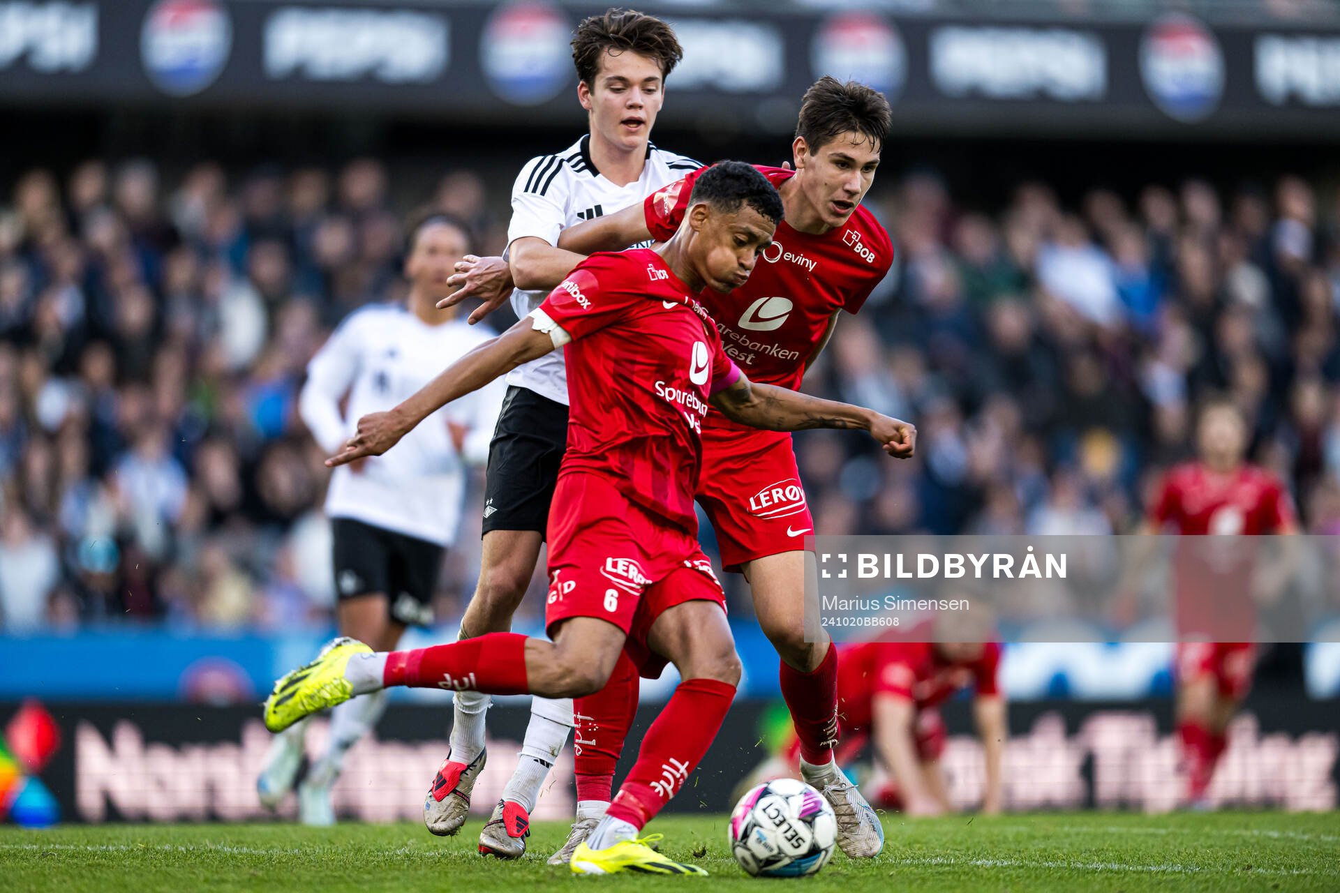 Sverre Halseth Nypan of Rosenborg, Japhet Sery Larsen and