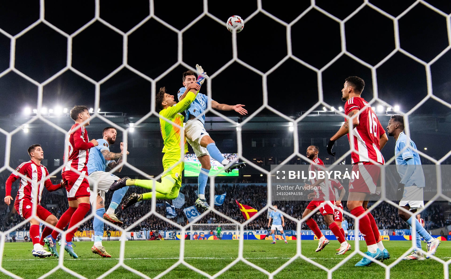 Colin Rösler of Malmö FF in action with goalkeeper Kostas