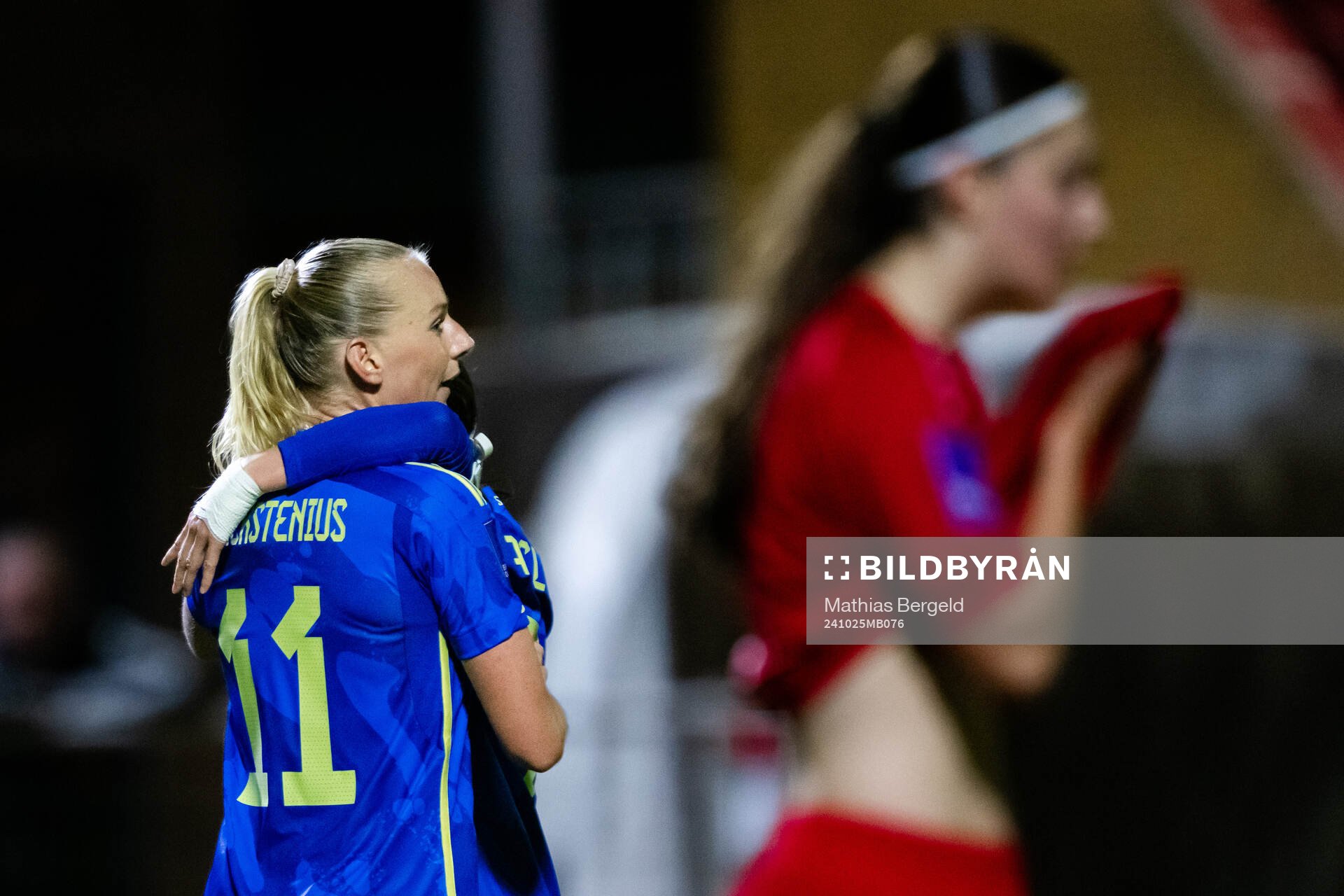 Stina Blackstenius and Kosovare Asllani of Sweden celebrate