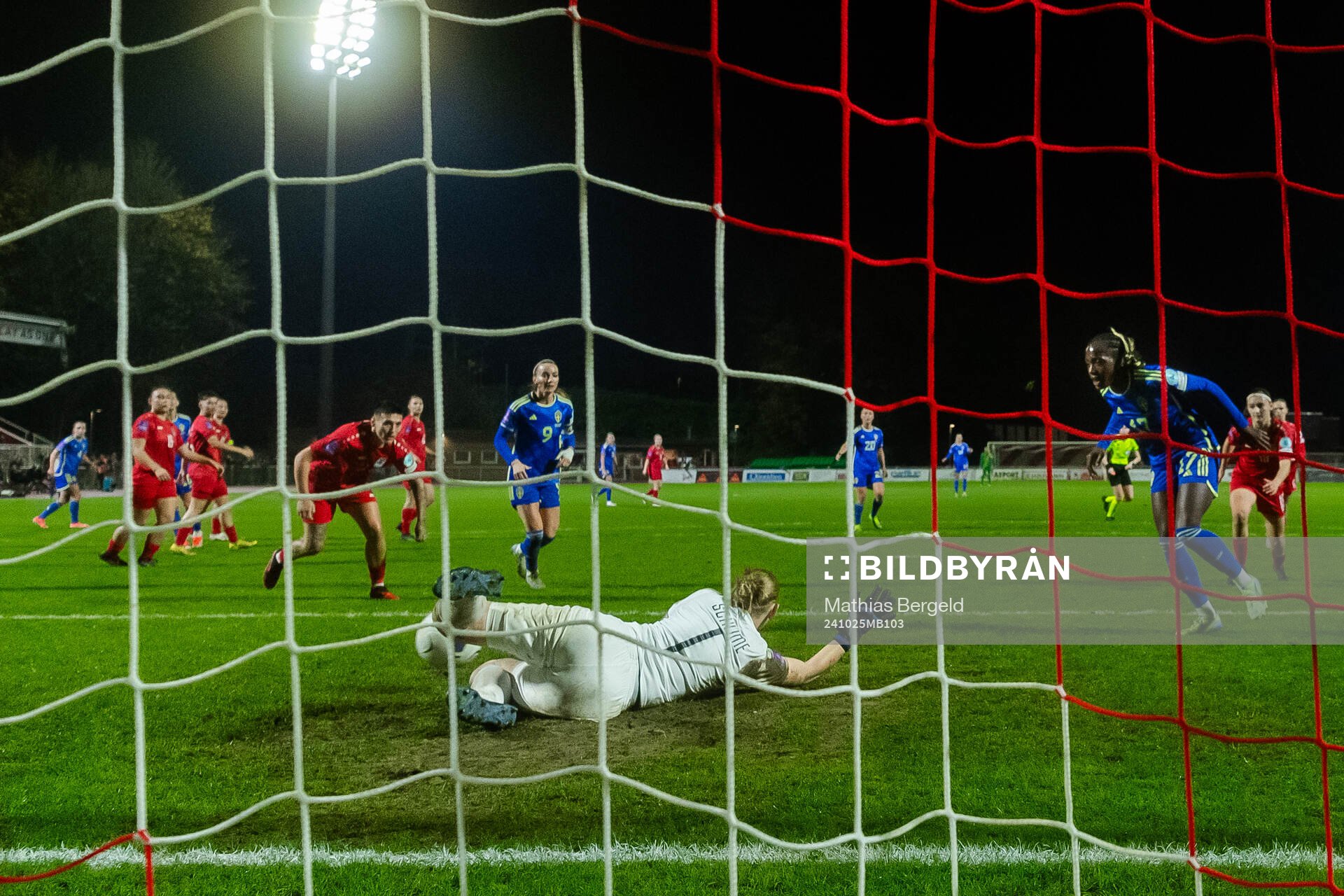 Evelyn Ijeh of Sweden scores the 0-4 goal behind goalkeeper