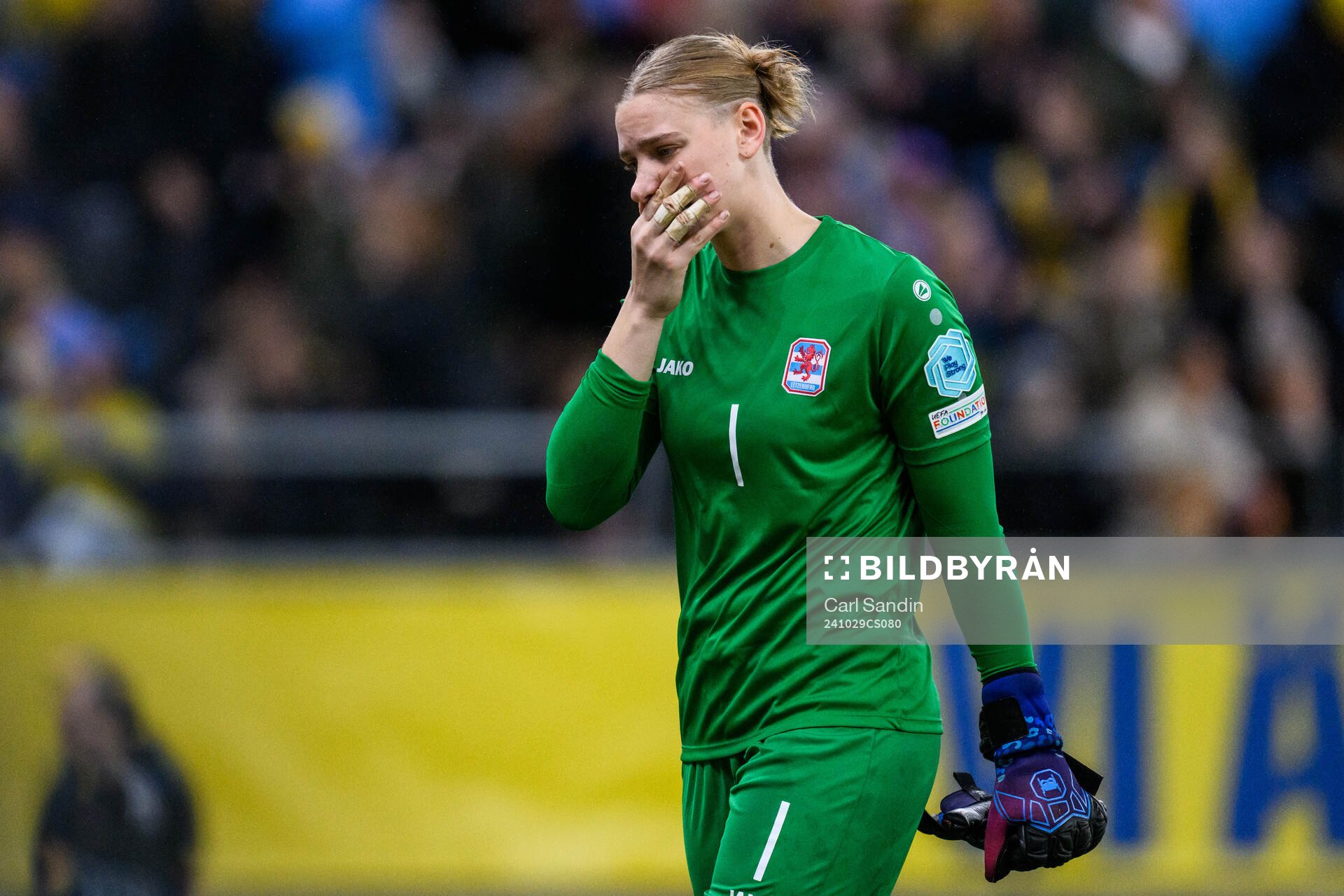 goalkeeper Lucie Schlime of Luxembourg looks dejected at