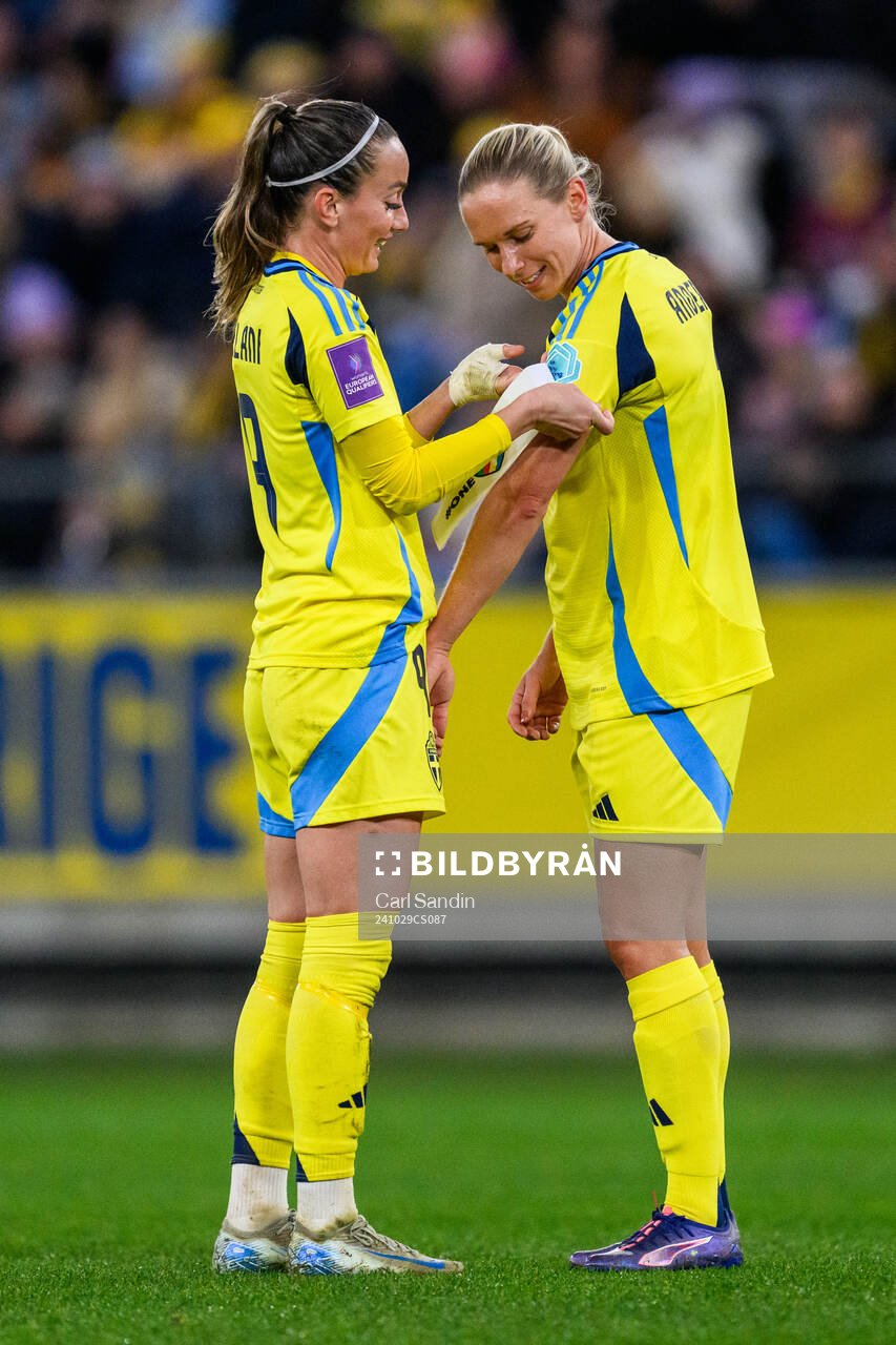 Kosovare Asllani and Jonna Andersson of Sweden
