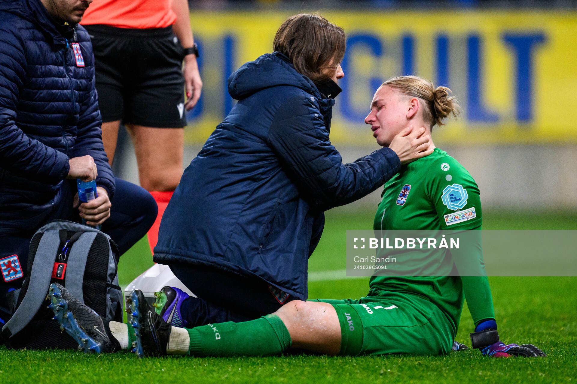 goalkeeper Lucie Schlime of Luxembourg recieves medical