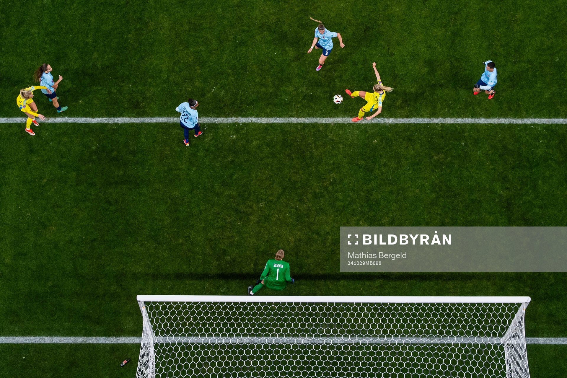 Rebecka Blomqvist of Sweden scores 8-0 behind goalkeeper