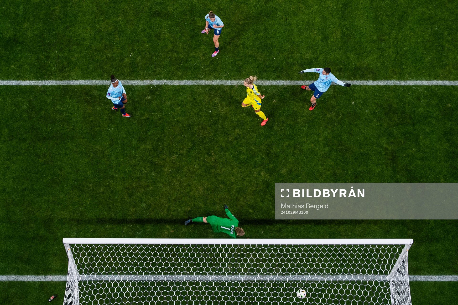 Rebecka Blomqvist of Sweden scores 8-0 behind goalkeeper