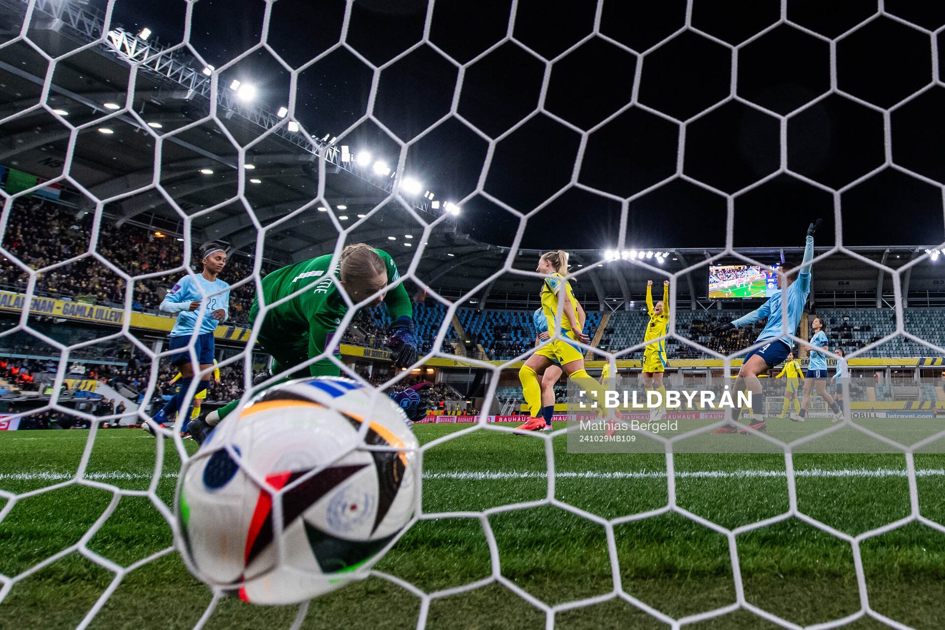 Rebecka Blomqvist of Sweden scores 8-0 behind goalkeeper