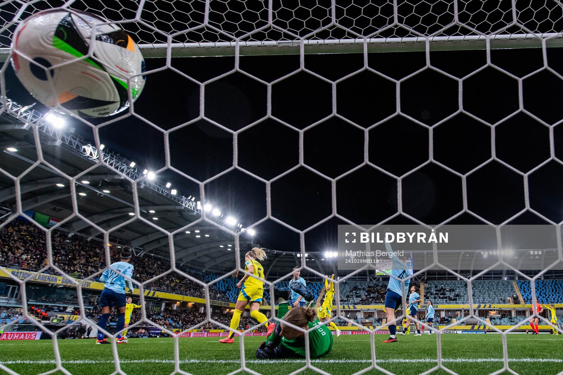 Rebecka Blomqvist of Sweden scores 8-0 behind goalkeeper