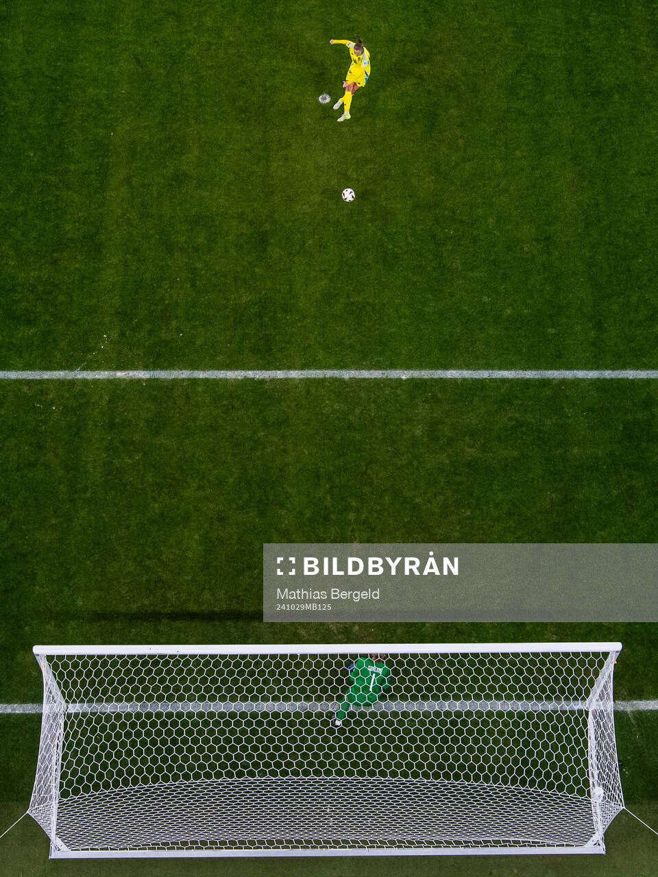 Filippa Angeldahl of Sweden scores 3-0 behind goalkeeper