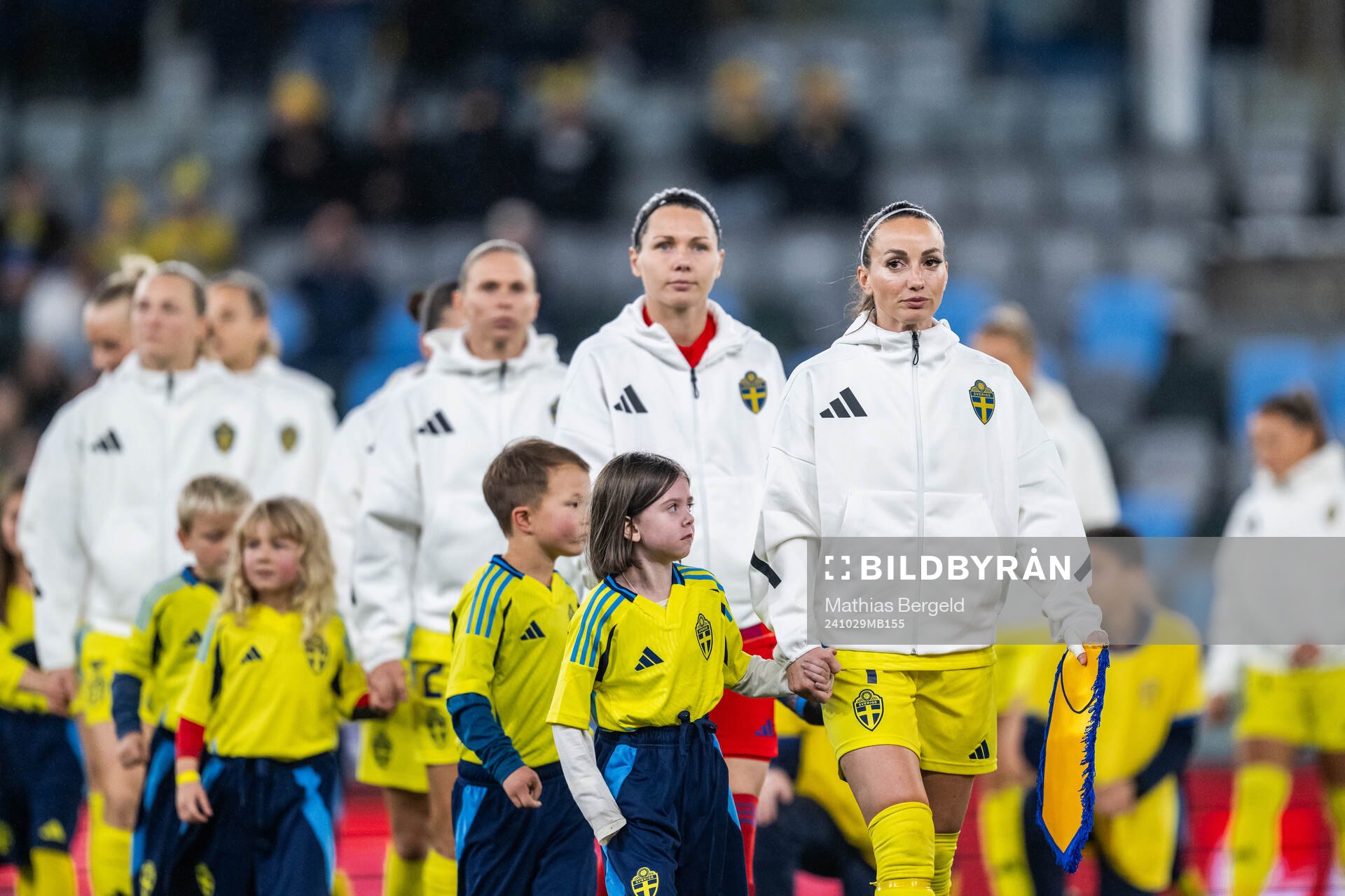 Goalkeeper Jennifer Falk and Kosovare Asllani of Sweden