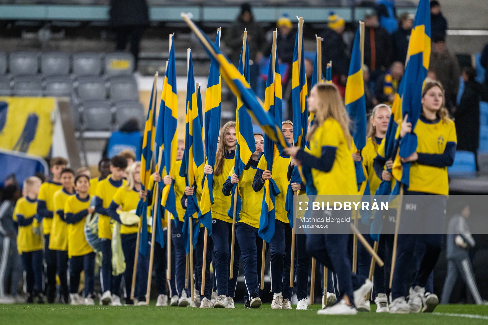 Flag bearers of Sweden ahead of the UEFA Women's Euro Qualifier first round play-off football match between Sweden and Luxembourg on October 29, 2024 in Gothenburg.