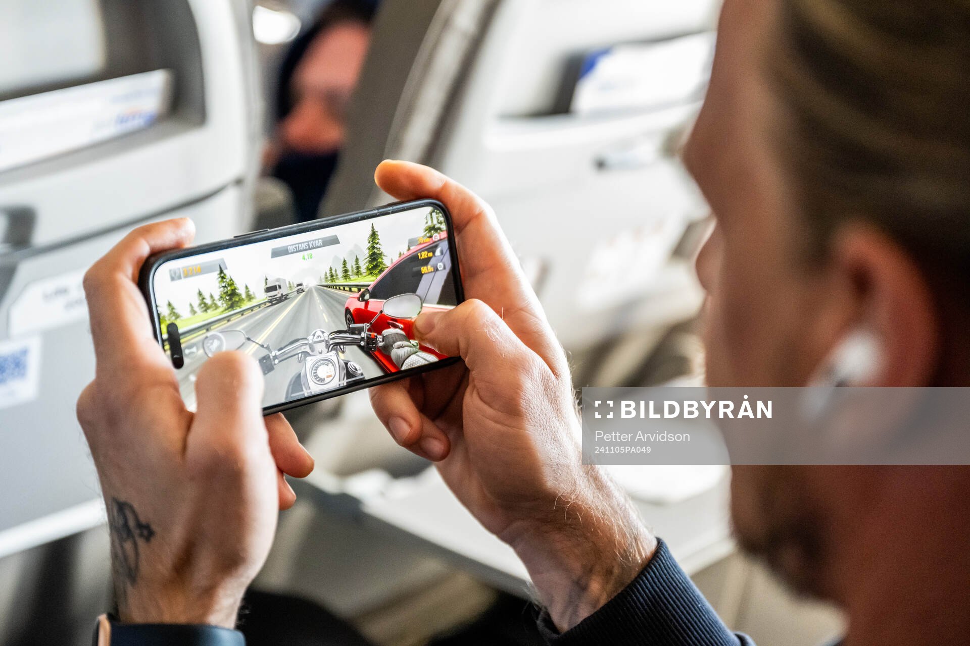 Goalkeeper Johan Dahlin play mobile games