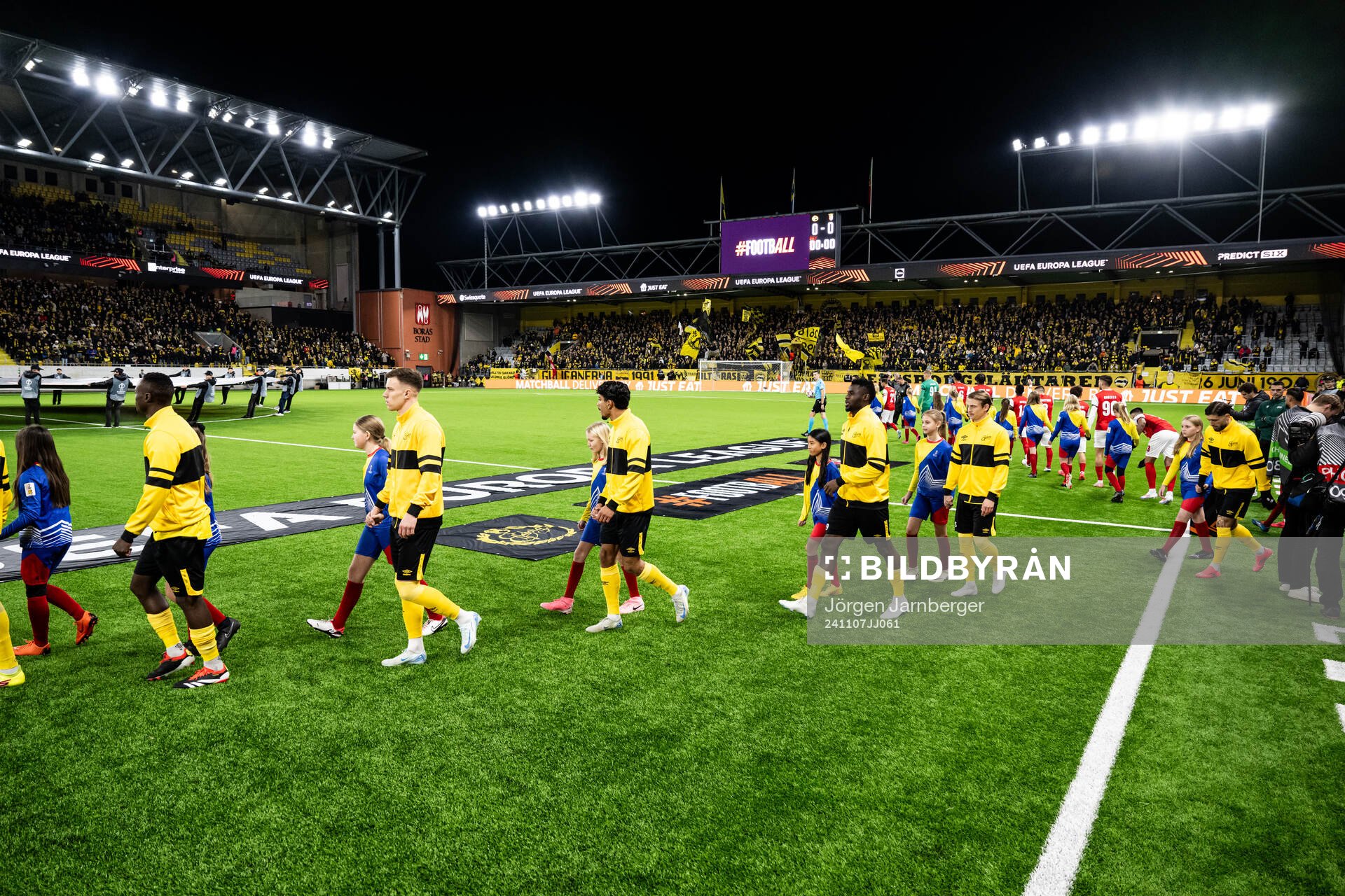 The teams enters the pitch