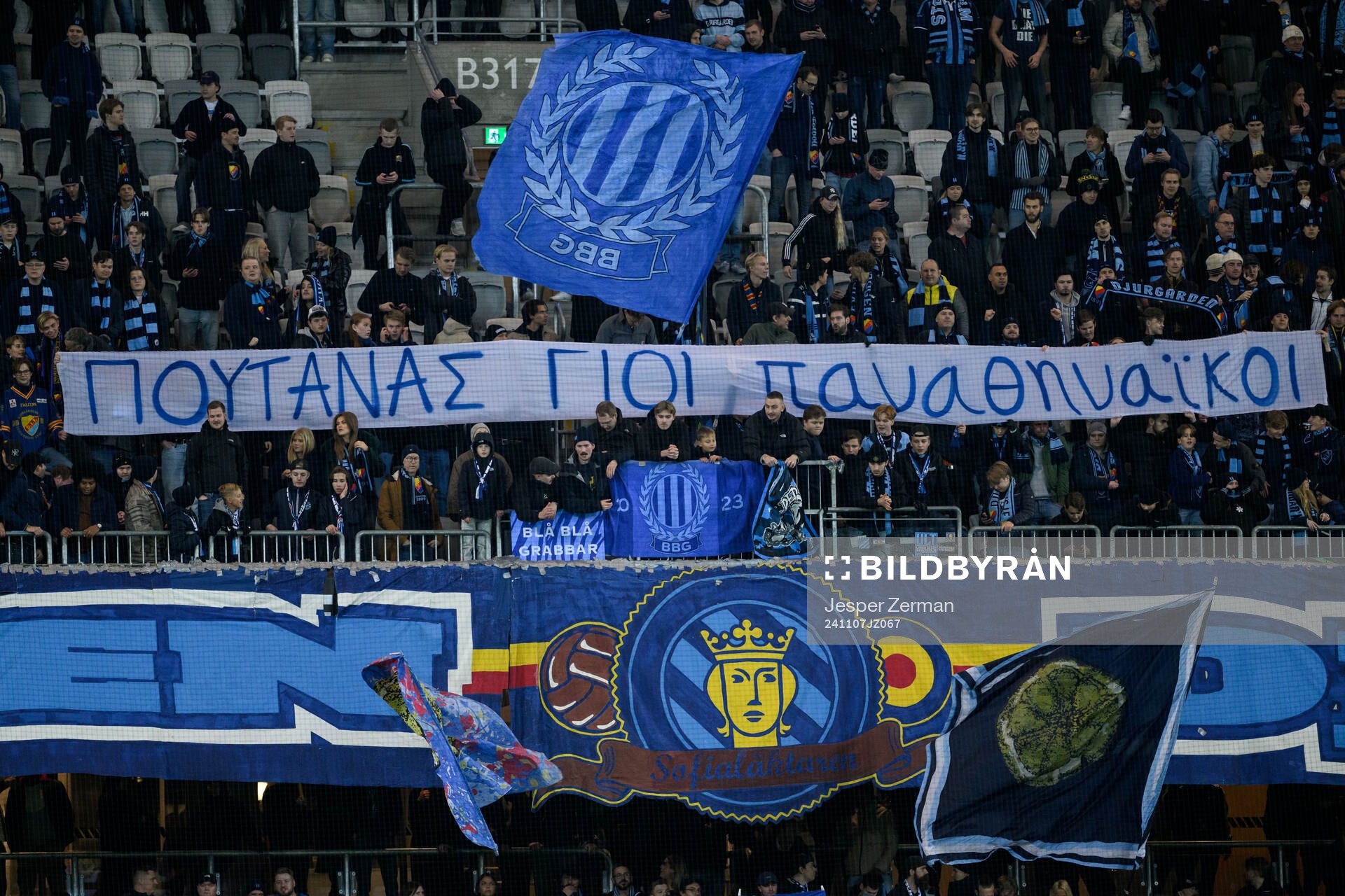 Fans of Djurgården with a banner in greek