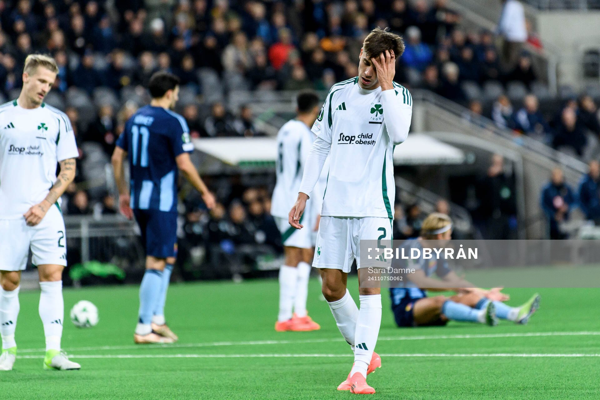 Giorgos Vagiannidis of Panathinaikos looks dejected