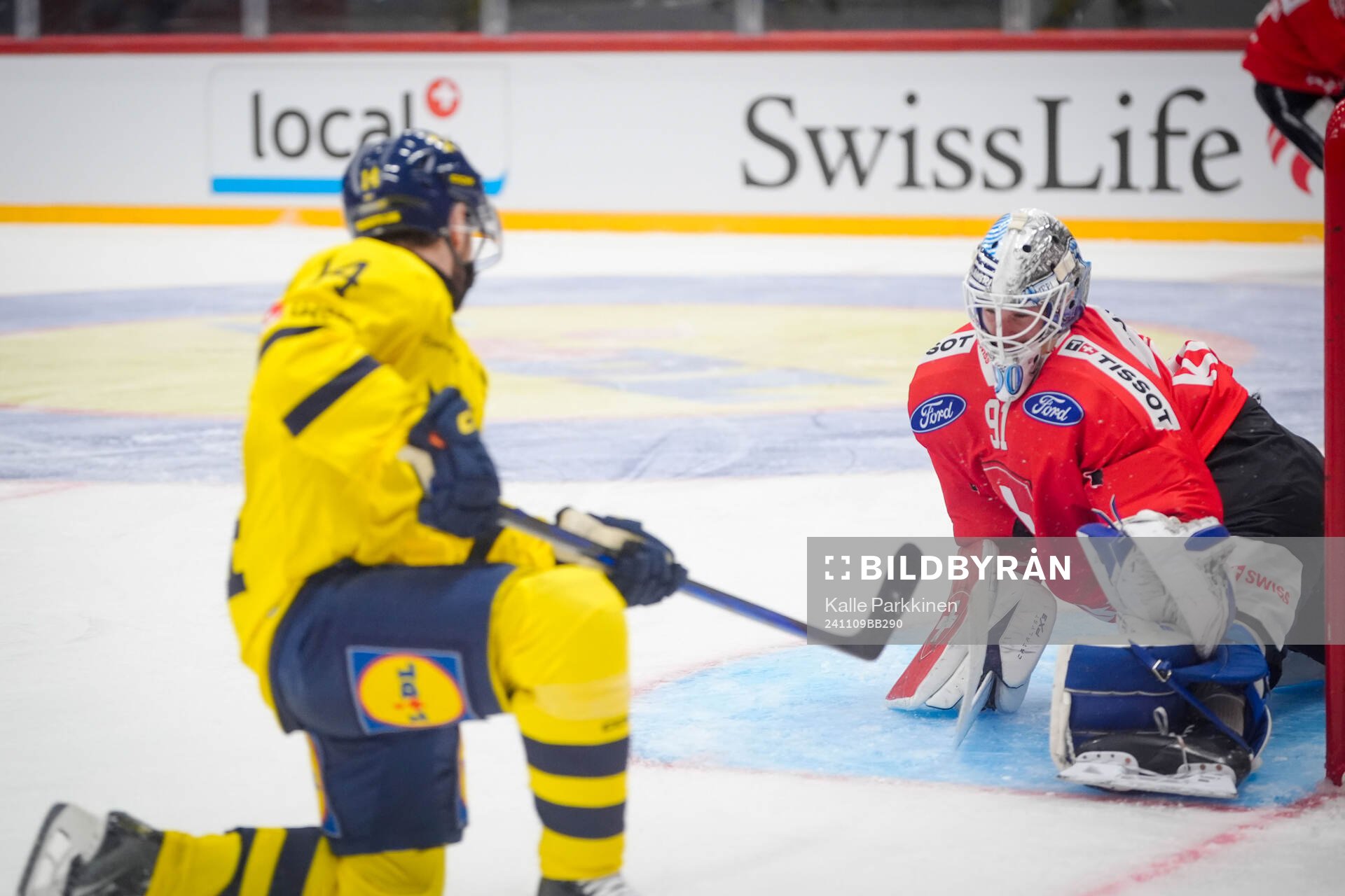 Oskar Lang of Sweden shoots to score 2-1 goal behind Gilles