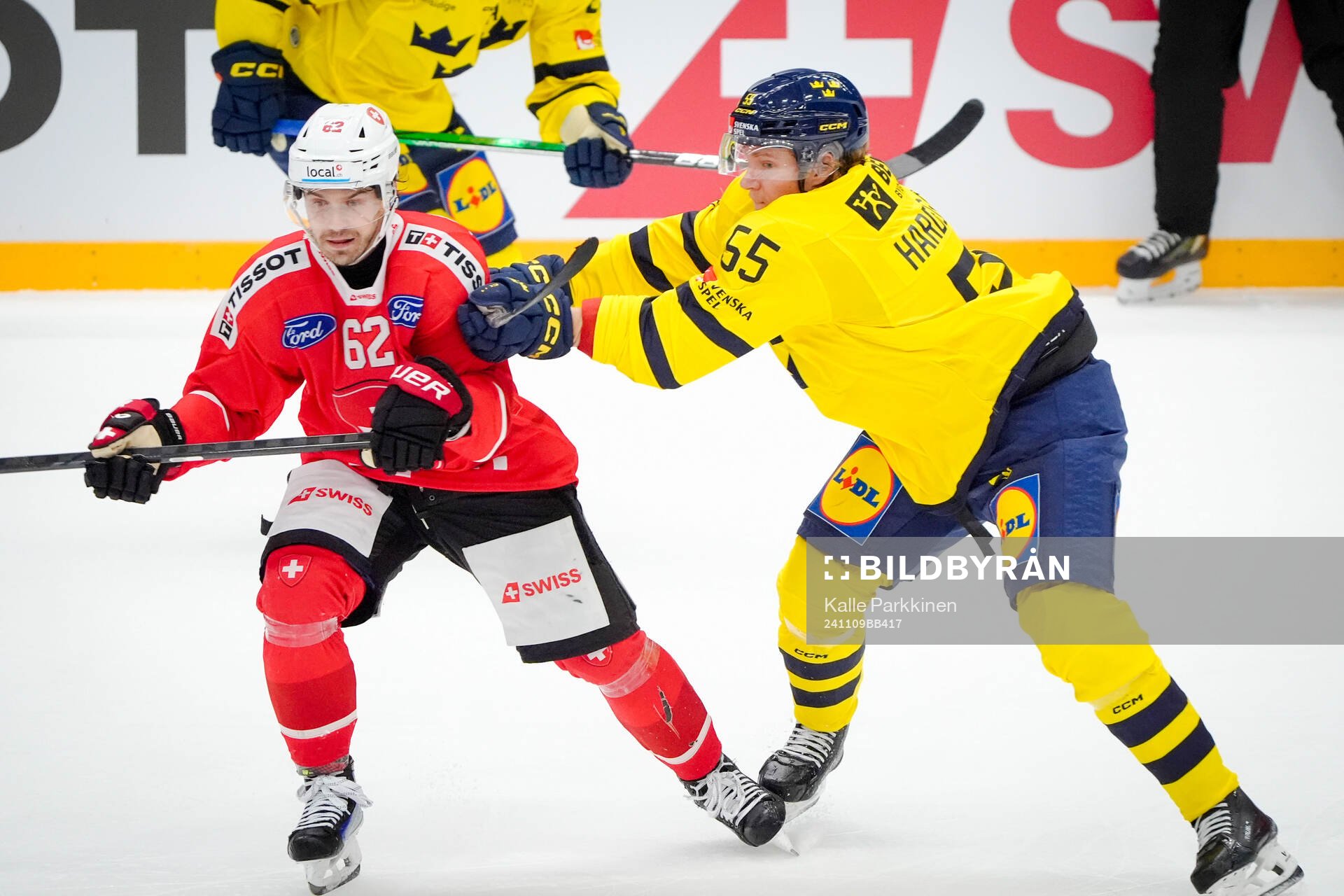 Denis Malgin of Switzerland and Marcus Hardegård of Sweden