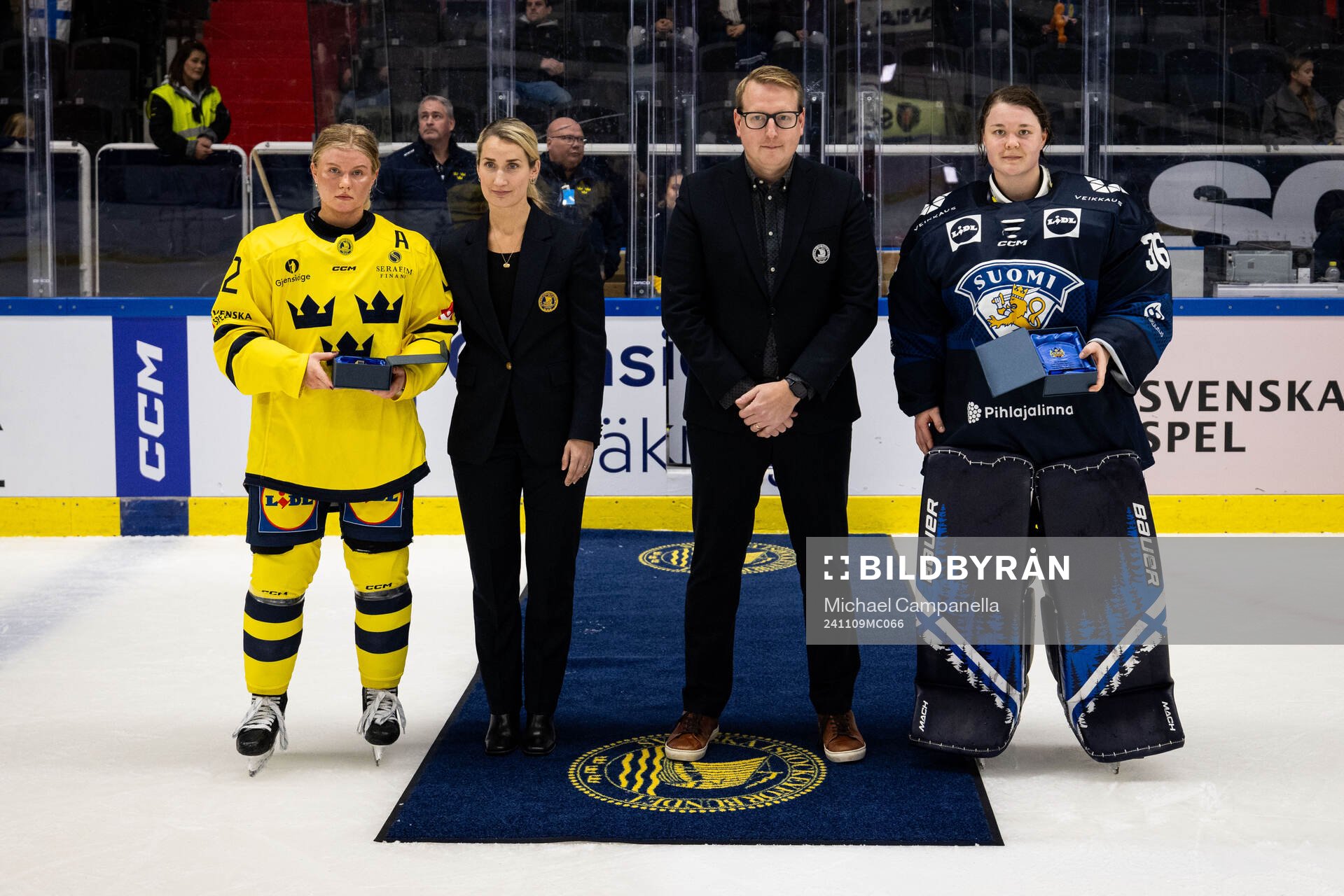 Maja Nylén-Persson of Sweden and goaltender Anni Keisala