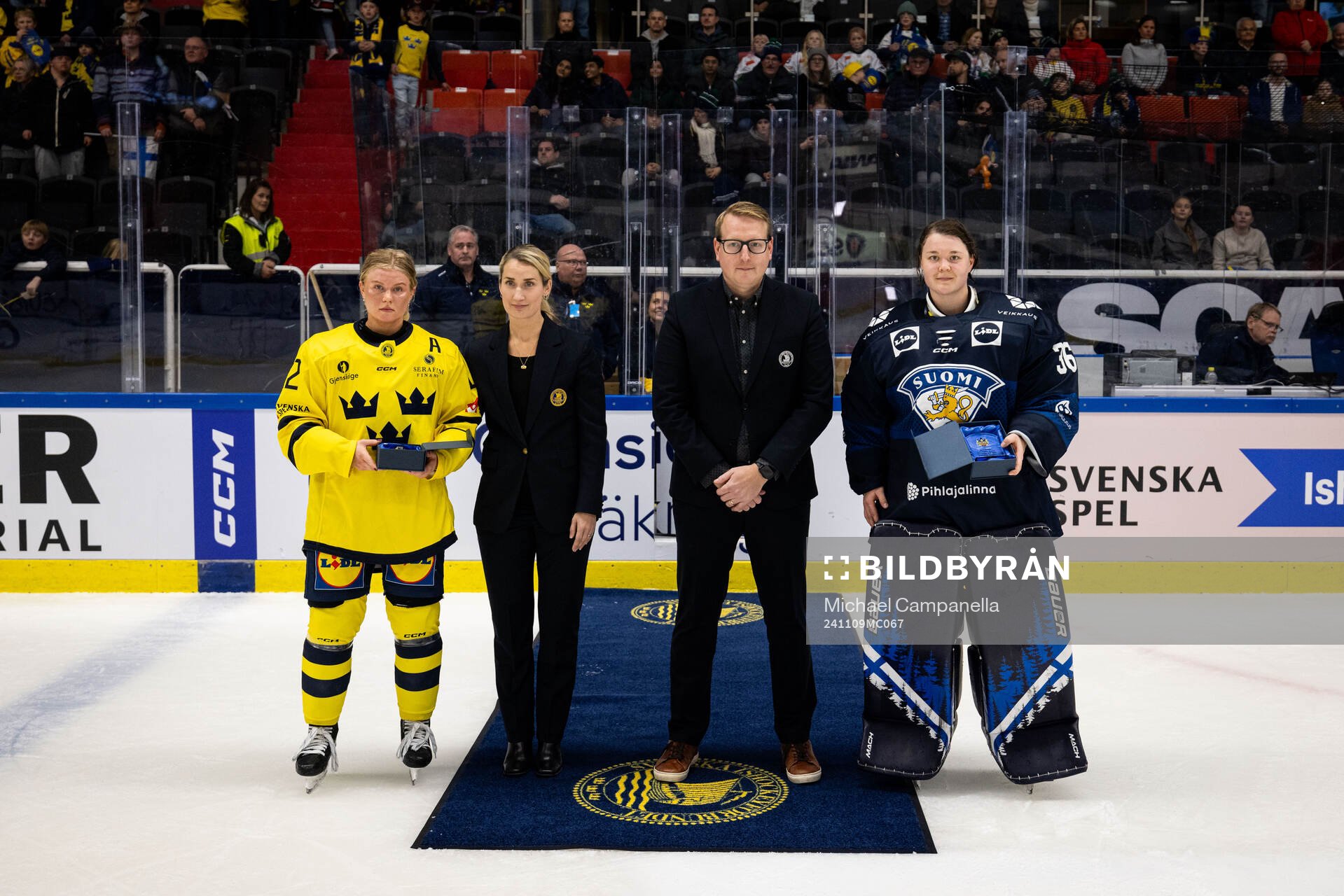Maja Nylén-Persson of Sweden and goaltender Anni Keisala