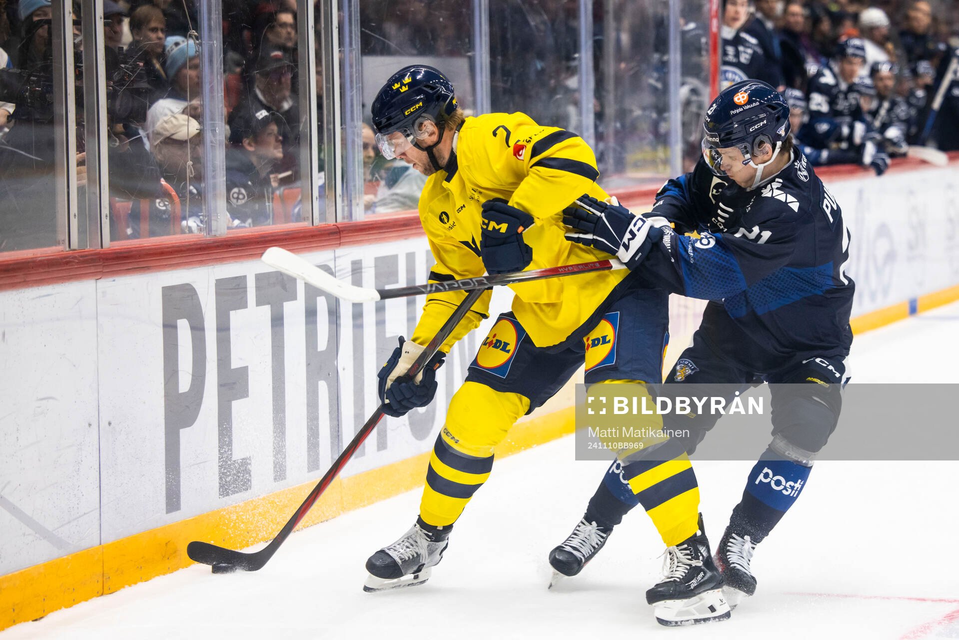 Christian Folin of Sweden and Patrik Puistola of Finland