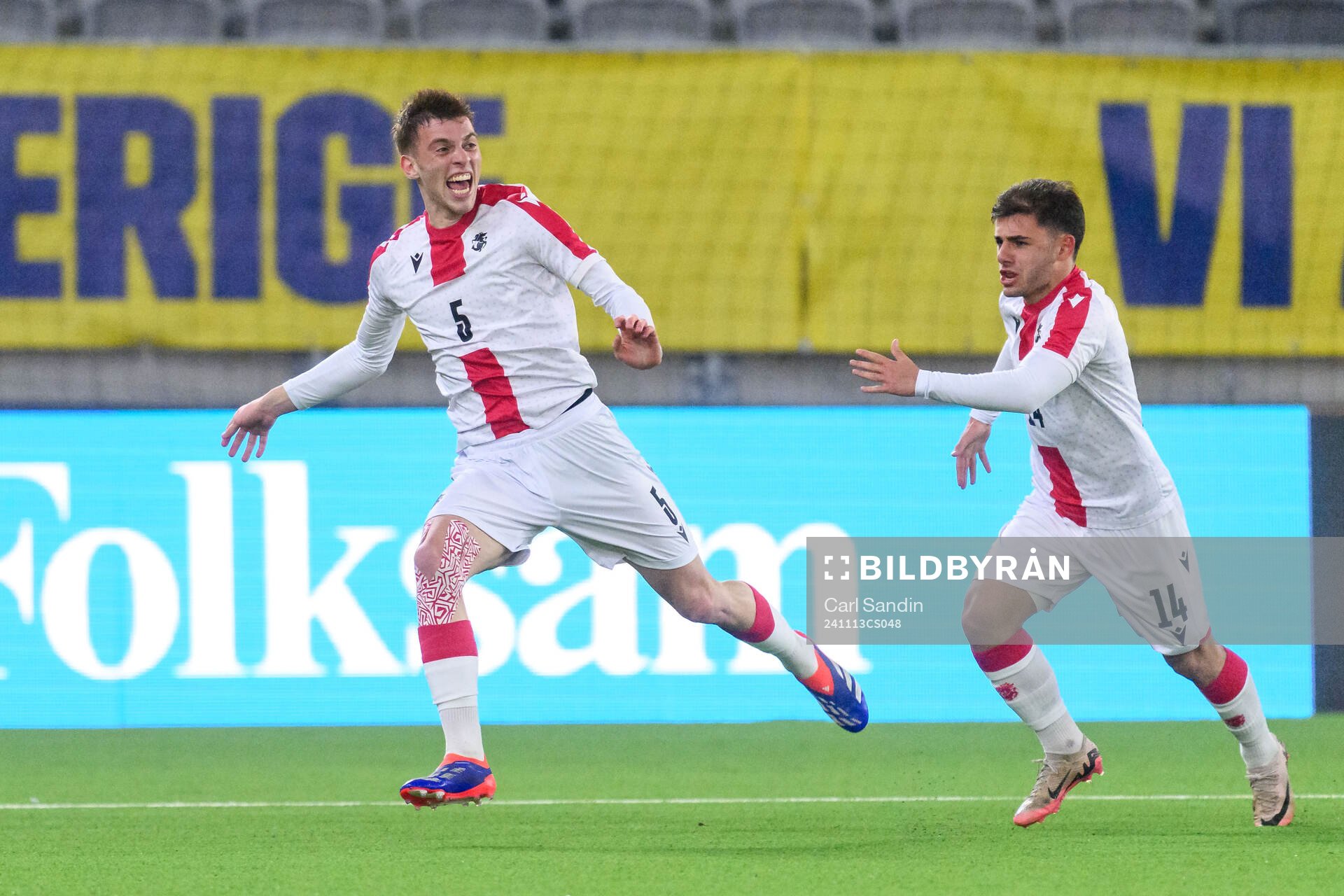 George Nikolaishvili of Georgia celebrates